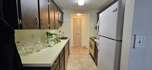 a room with furniture a mirror and wooden floor