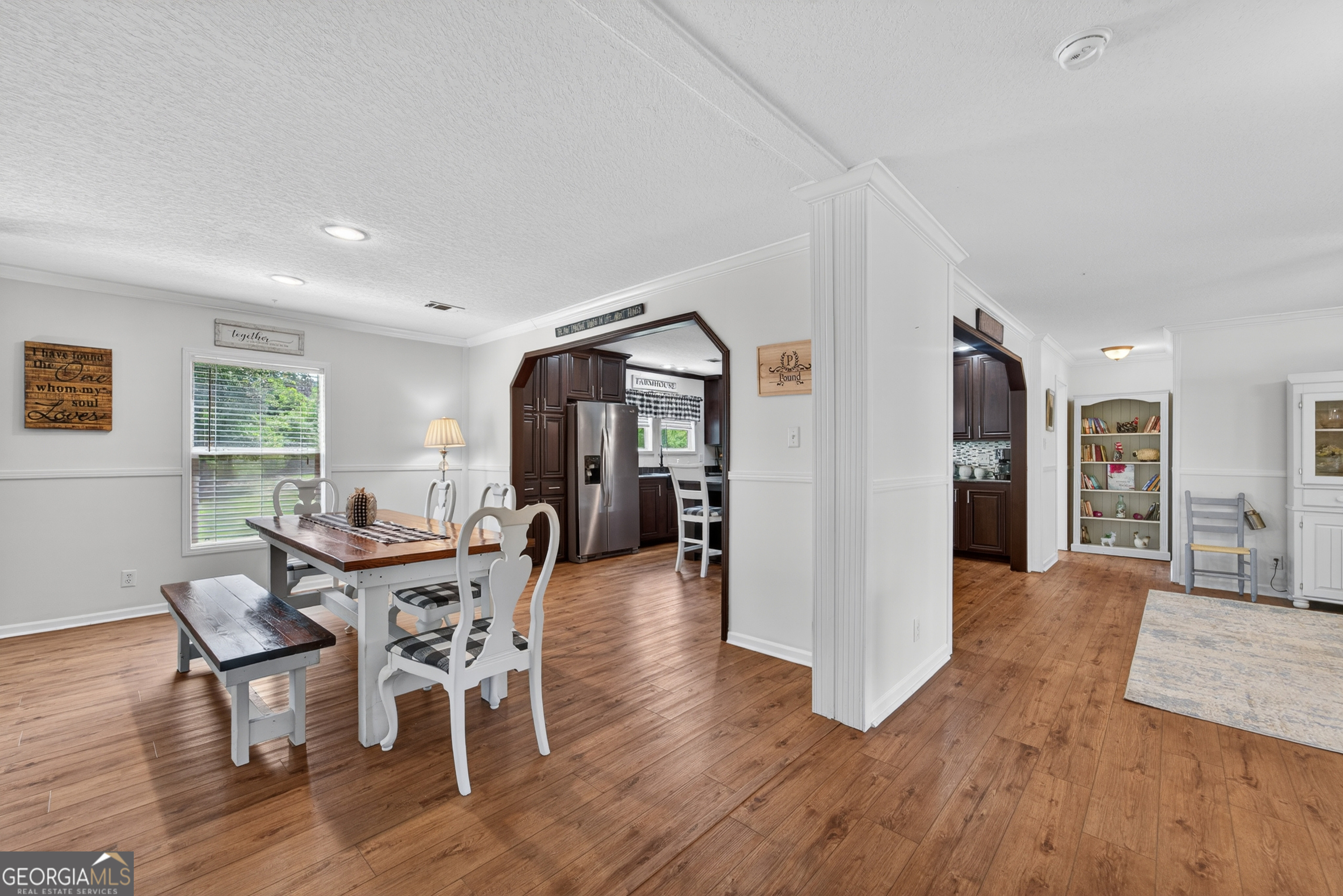 1953 Raybon Road West Hoboken, GA 31542 - Photo 7 of 31 a view of a dining room with furniture and wooden floor