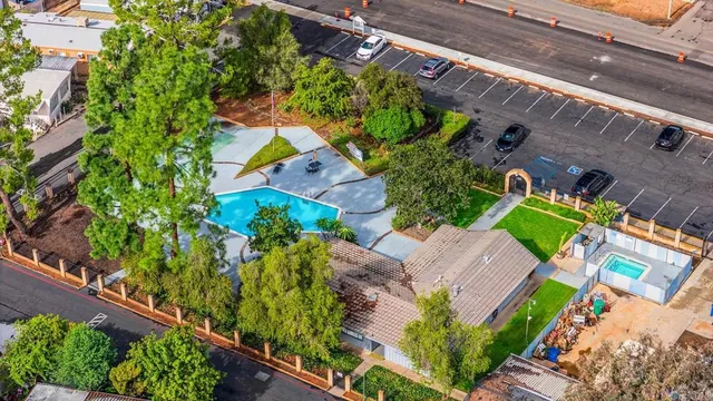 an aerial view of a house with a garden