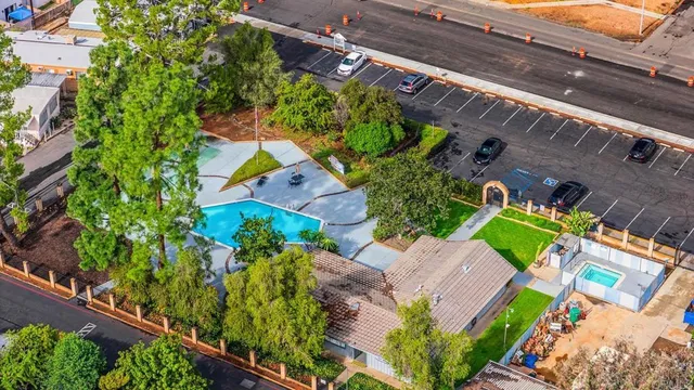 an aerial view of a house with a garden