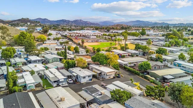 an aerial view of a city with lots of residential buildings