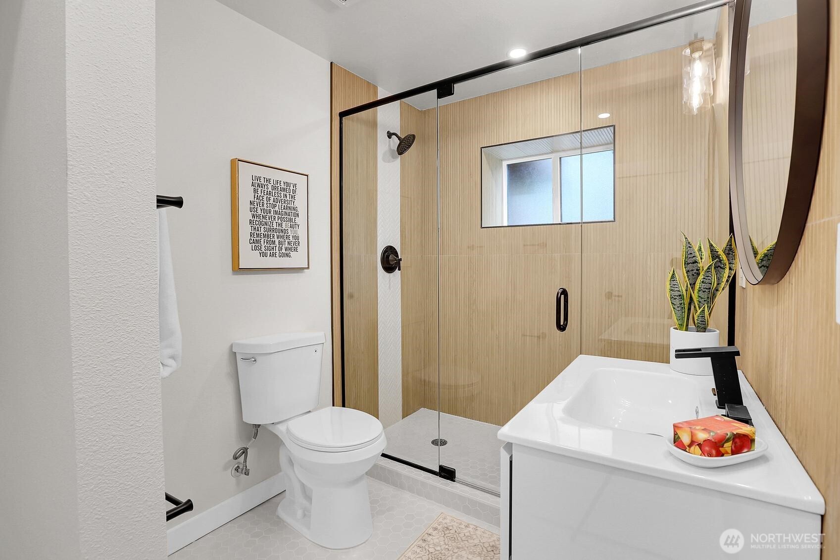 8421 39th Avenue Southwest Seattle, WA 98136 - Photo 16 of 24 a bathroom with a toilet a sink and a shower