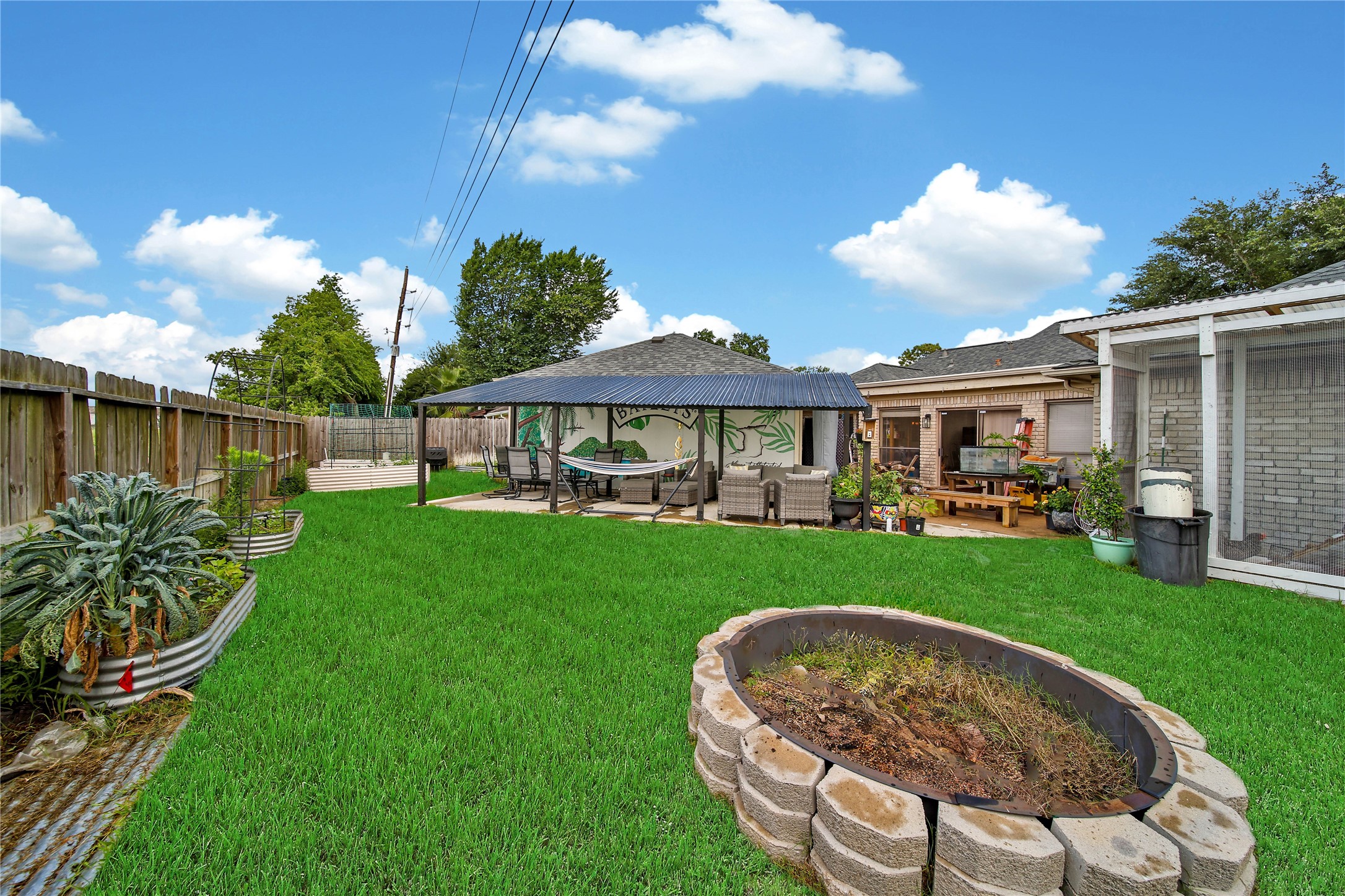 15319 Rio Plaza Drive Houston, TX 77083 - Photo 25 of 26 Good amount of yard space for entertaining and gardening.