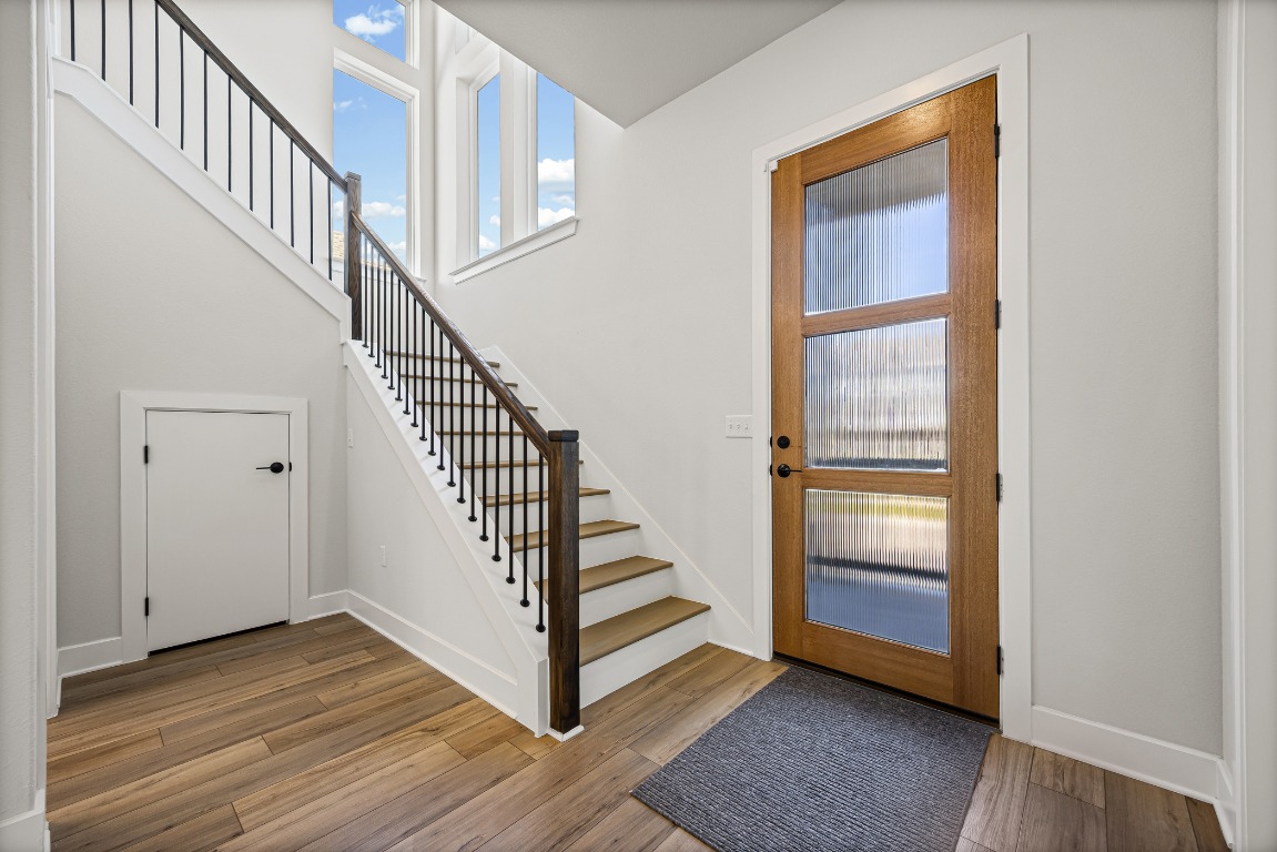 5806 Rangeland Road Austin, TX 78747 - Photo 20 of 33 a view of entryway and hall with wooden floor