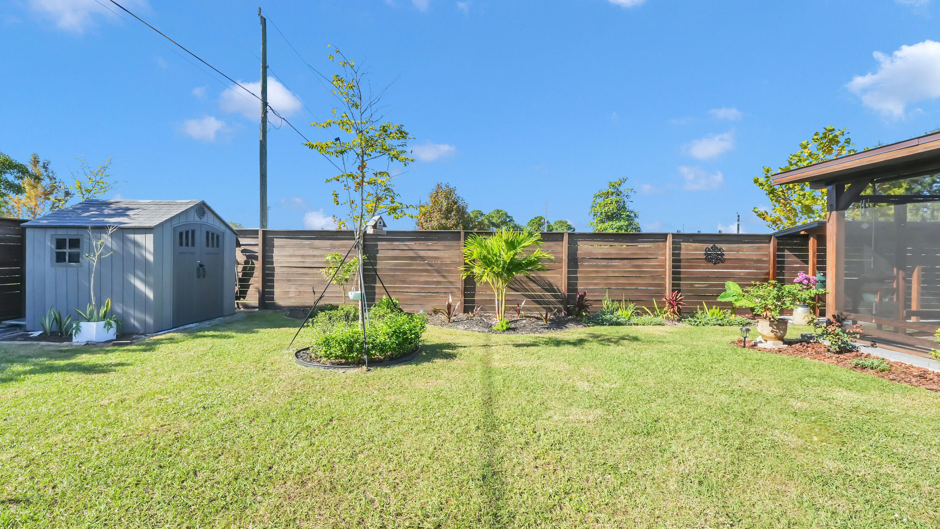 1382 Southwest Becker Road Port St. Lucie, FL 34953 - Photo 46 of 55 7ft real wood fencce