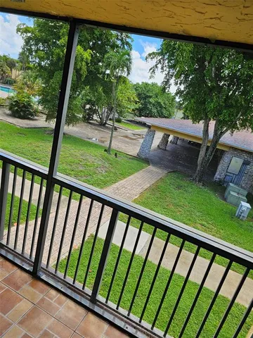 a view of a backyard with a garden