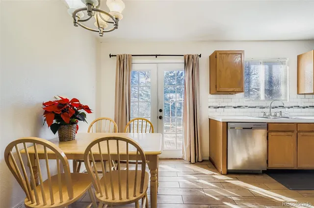 a view of a livingroom with furniture window and wooden floor