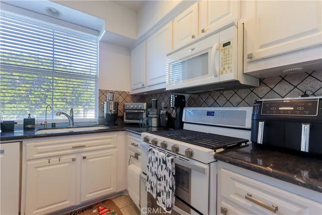 a view of a two chairs in the roof deck