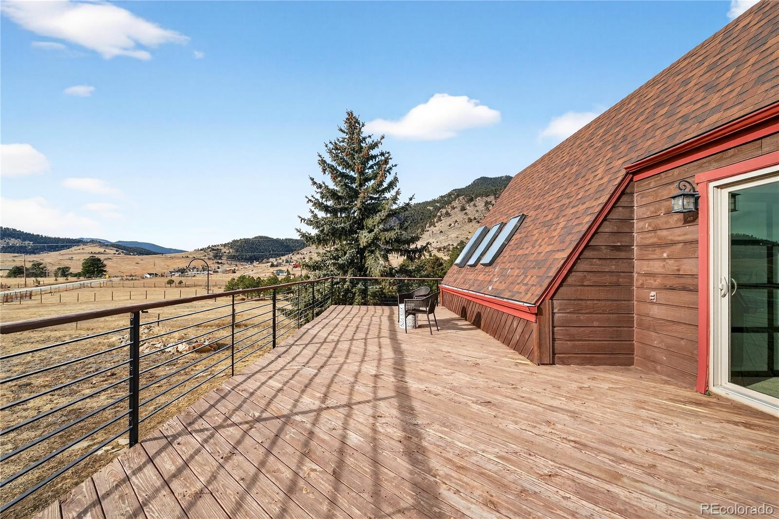 31249 Robinson Hill Road Golden, CO 80403 - Photo 29 of 48 a view of balcony with furniture