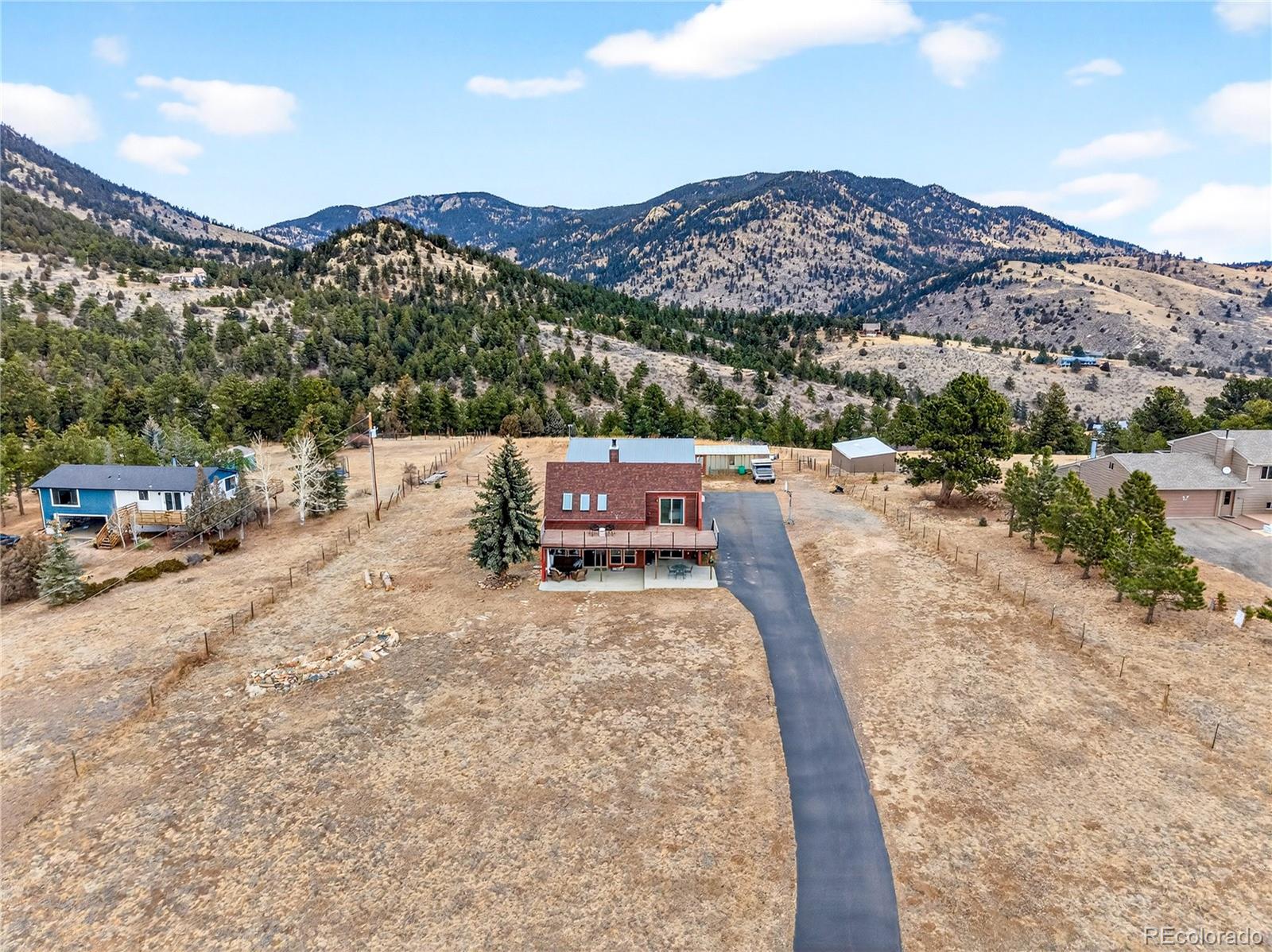 31249 Robinson Hill Road Golden, CO 80403 - Photo 40 of 48 a view of city view and mountain view