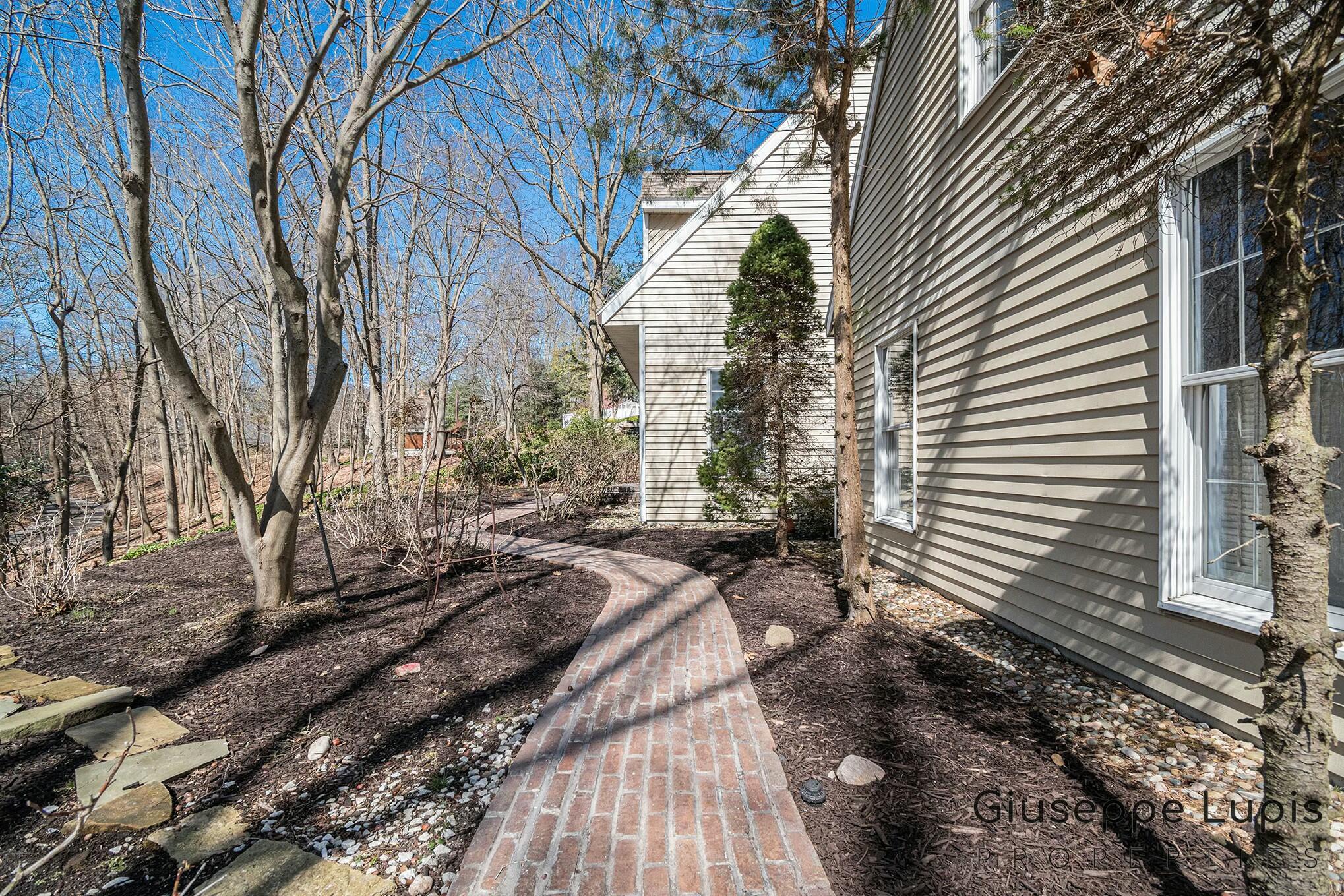 309 Stickney Ridge Road Grand Haven, MI 49417 - Photo 39 of 62 brick walkway