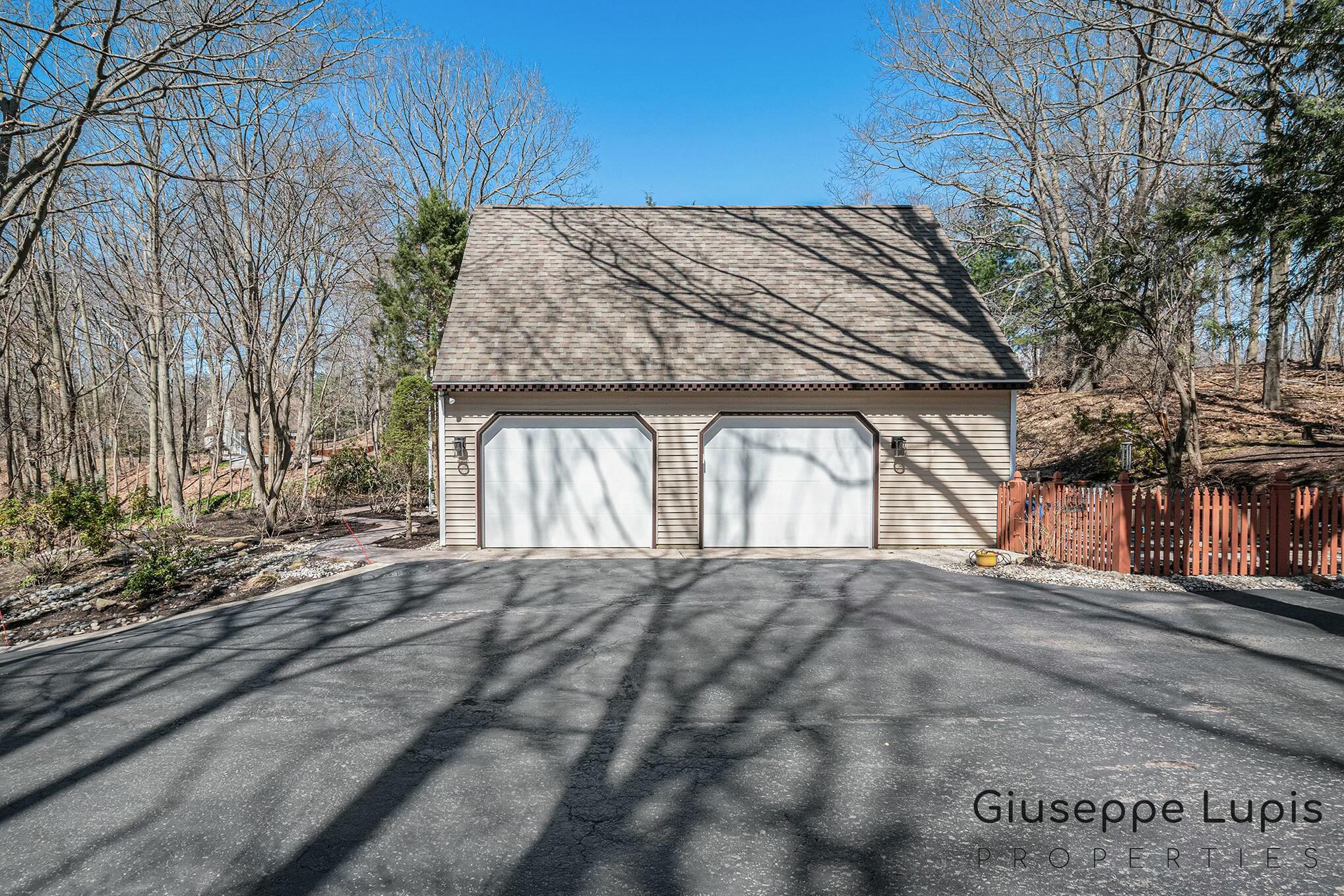 309 Stickney Ridge Road Grand Haven, MI 49417 - Photo 42 of 62 garage