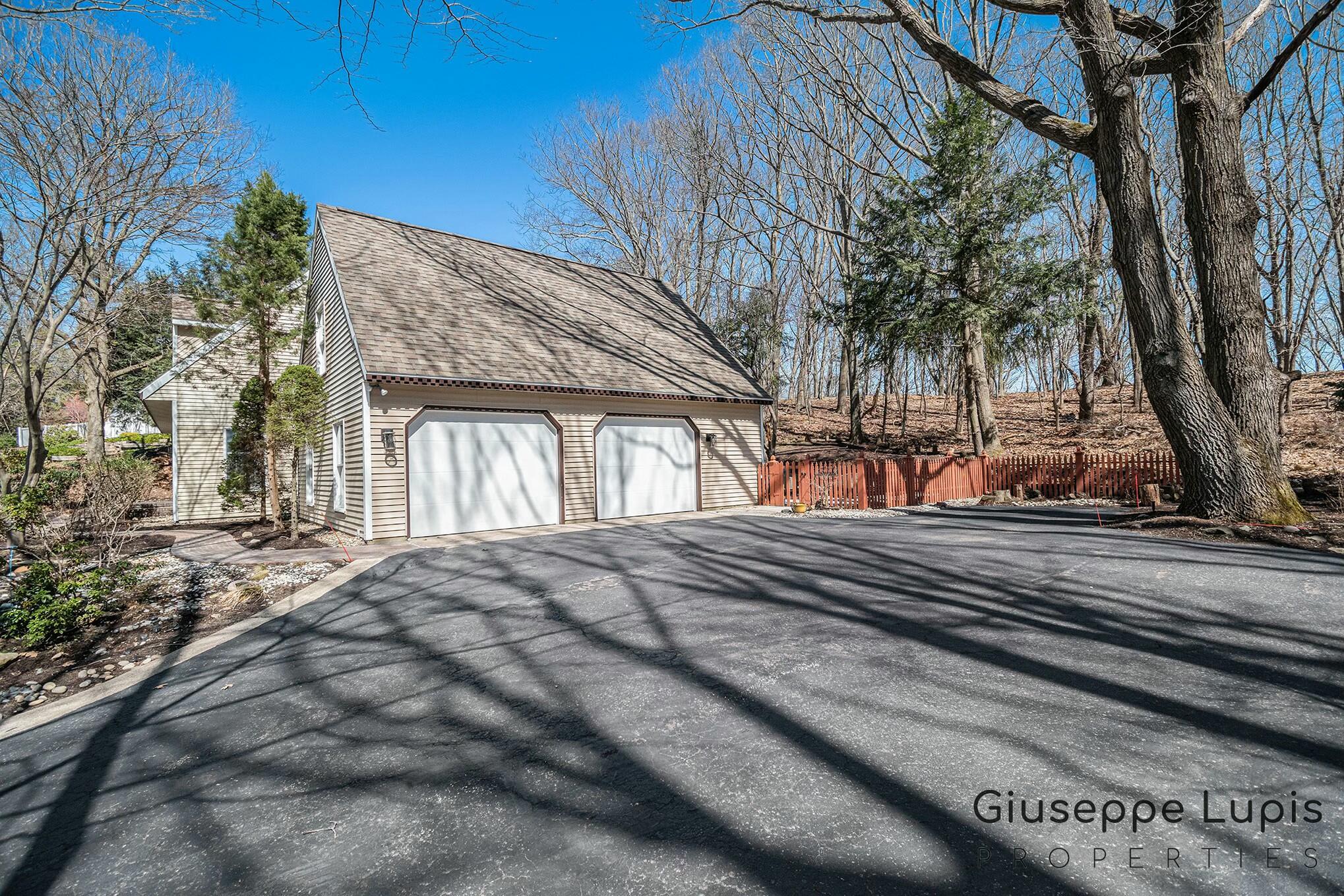 309 Stickney Ridge Road Grand Haven, MI 49417 - Photo 43 of 62 garage