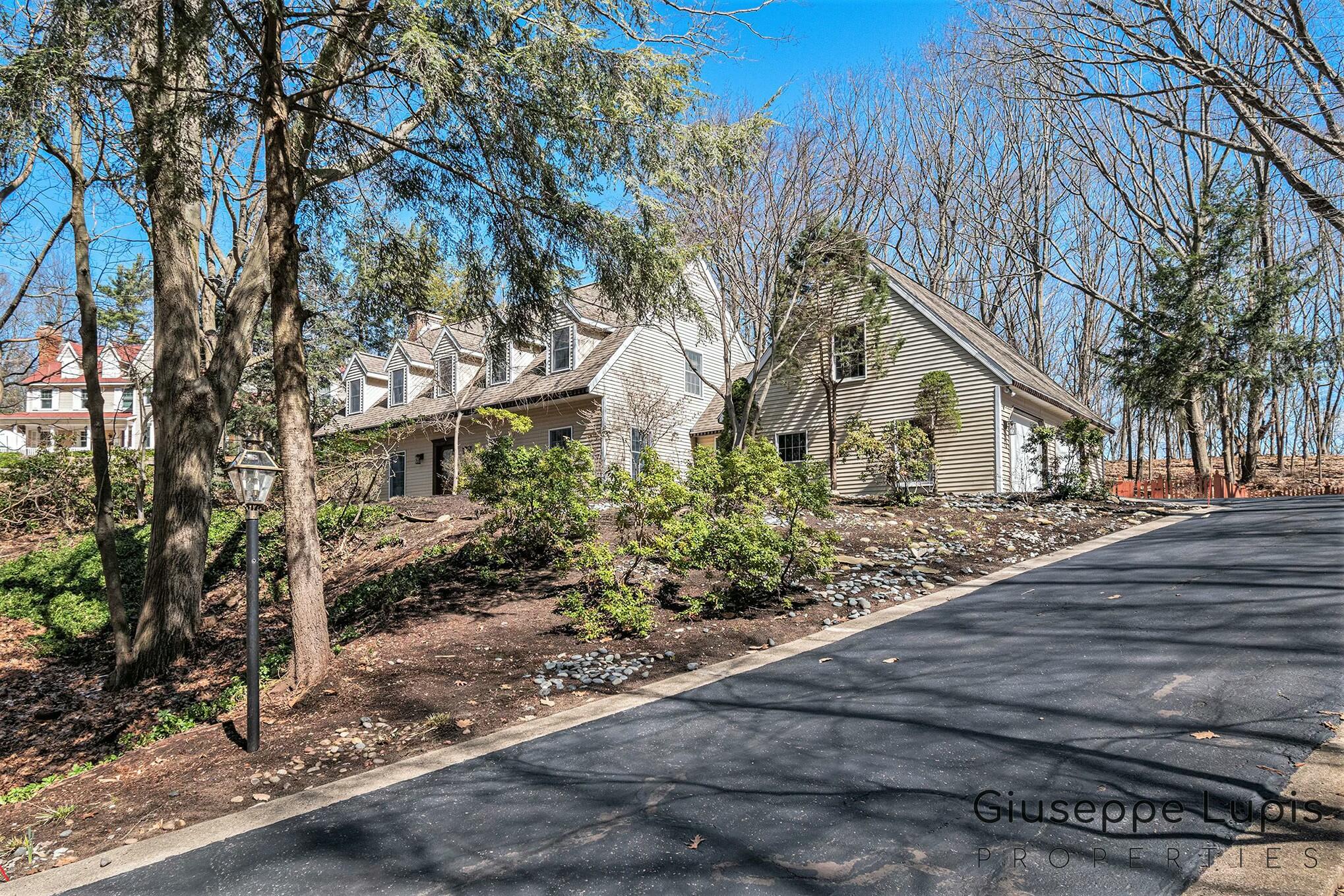309 Stickney Ridge Road Grand Haven, MI 49417 - Photo 5 of 62 driveway