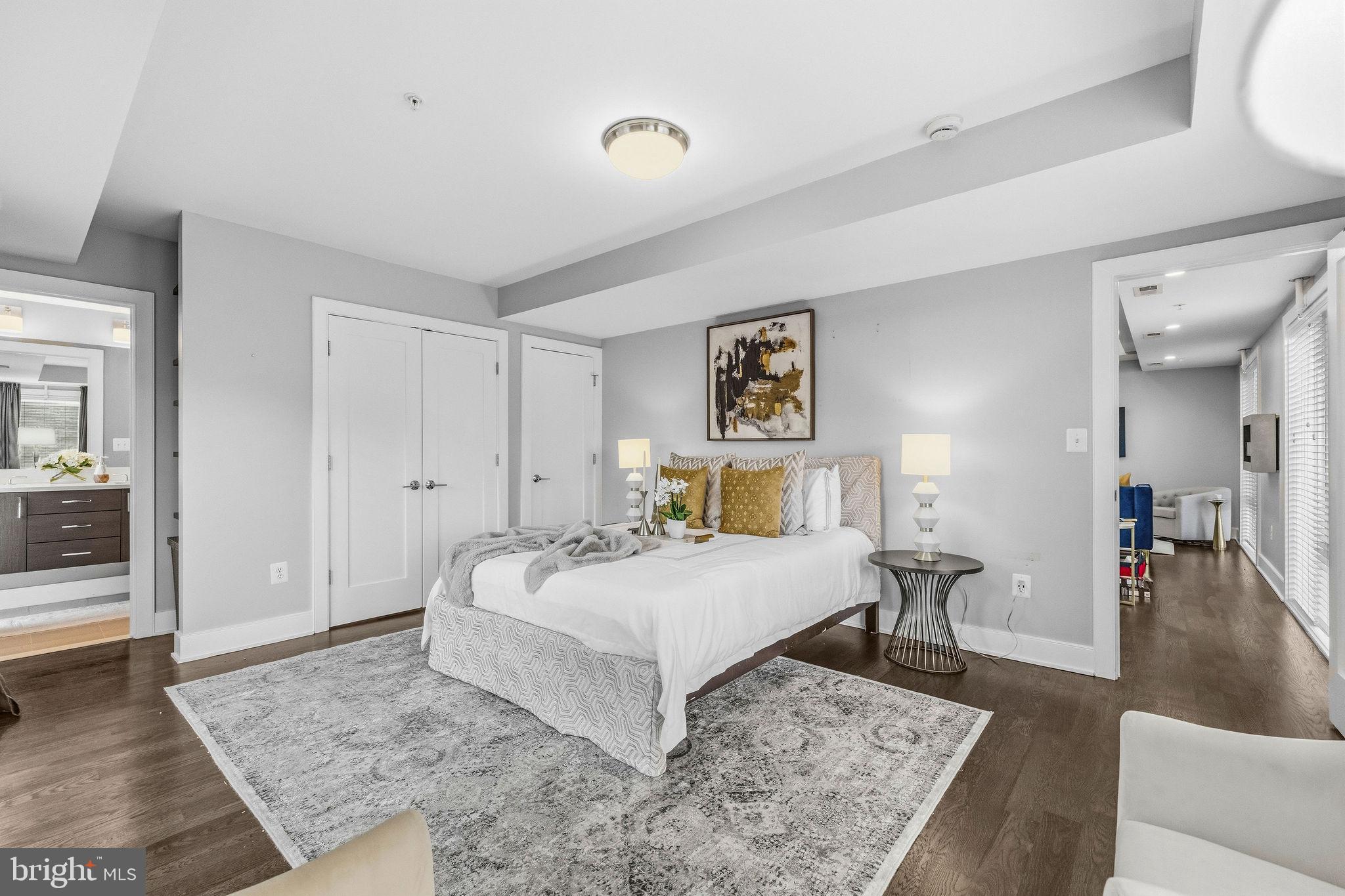 2012 Kalorama Road Northwest, Unit 8 Washington, DC 20009 - Photo 11 of 25 a bedroom with a bed and a couch