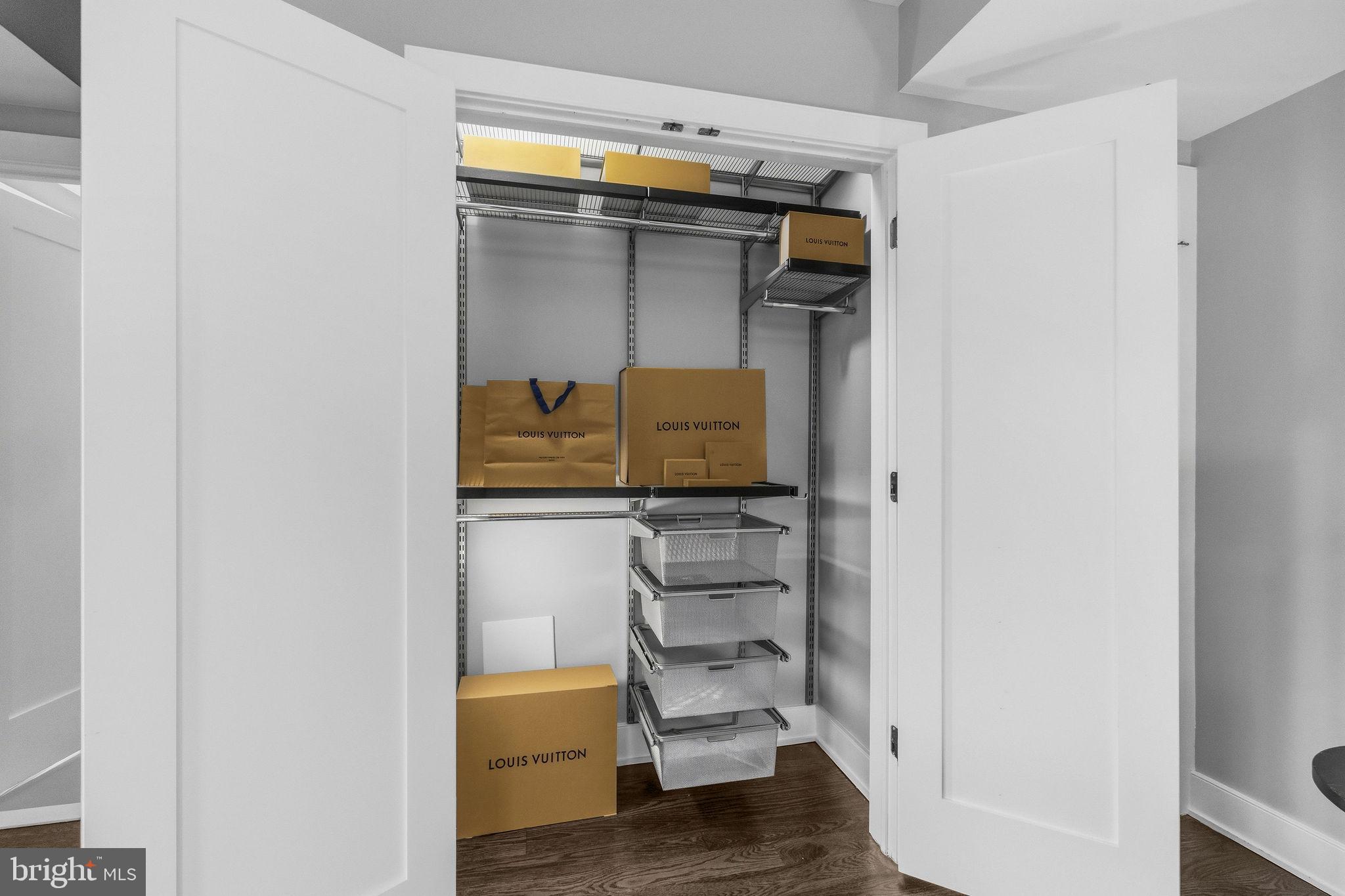 2012 Kalorama Road Northwest, Unit 8 Washington, DC 20009 - Photo 12 of 25 a view of walk in closet with clothes and shoes