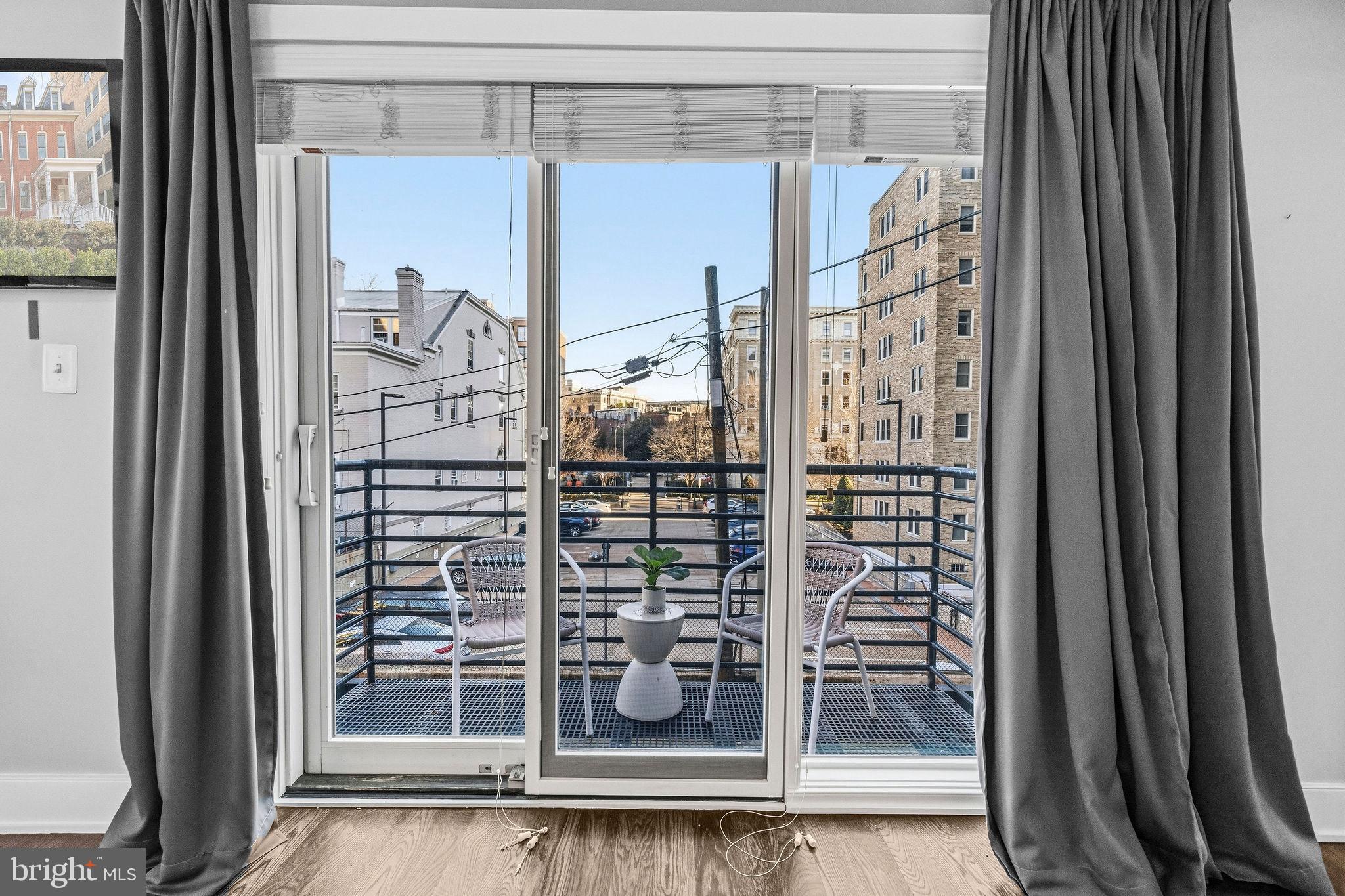 2012 Kalorama Road Northwest, Unit 8 Washington, DC 20009 - Photo 15 of 25 a view of a bathroom with a glass door and a window
