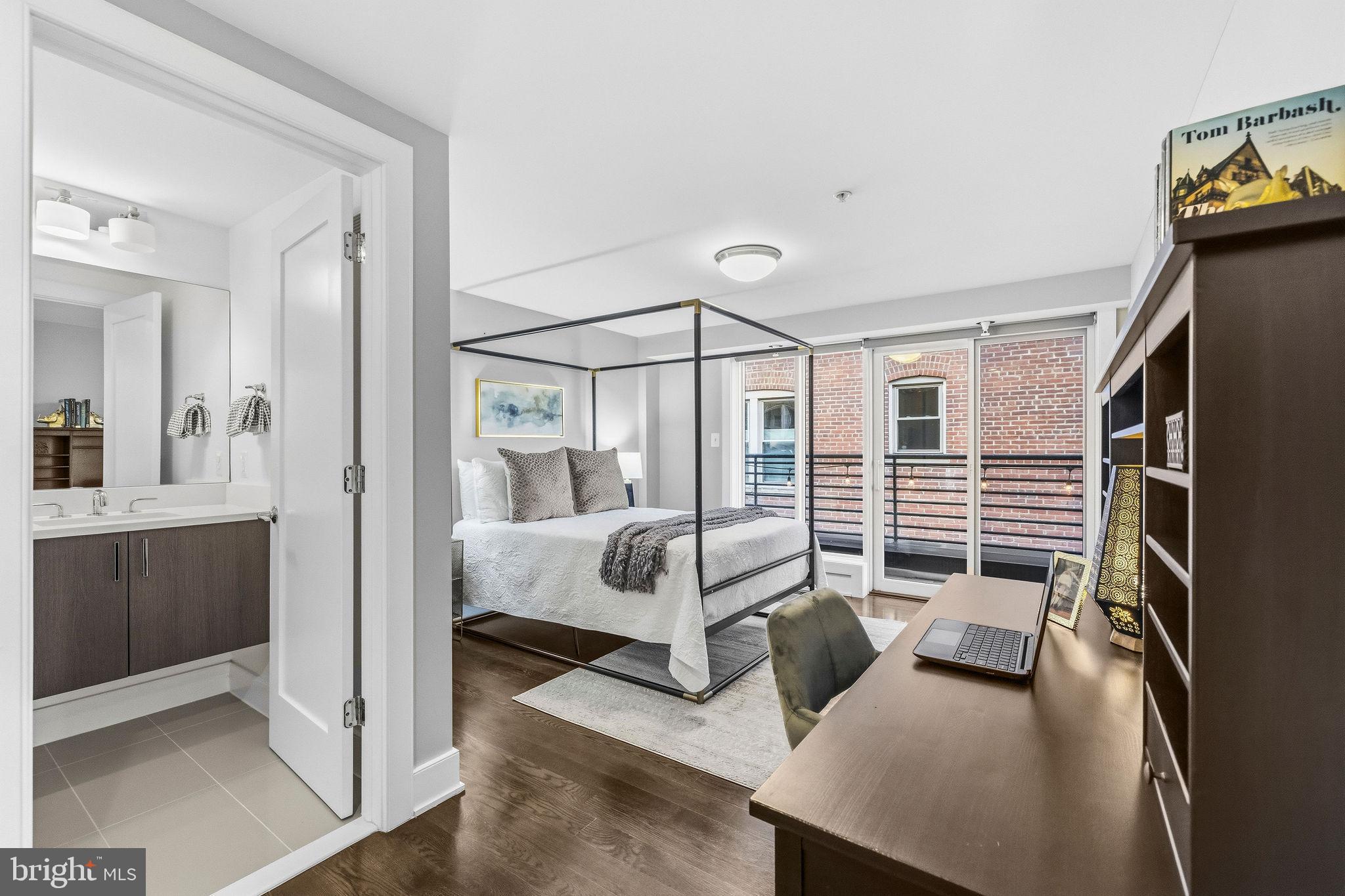 2012 Kalorama Road Northwest, Unit 8 Washington, DC 20009 - Photo 21 of 25 a bedroom with furniture and a window