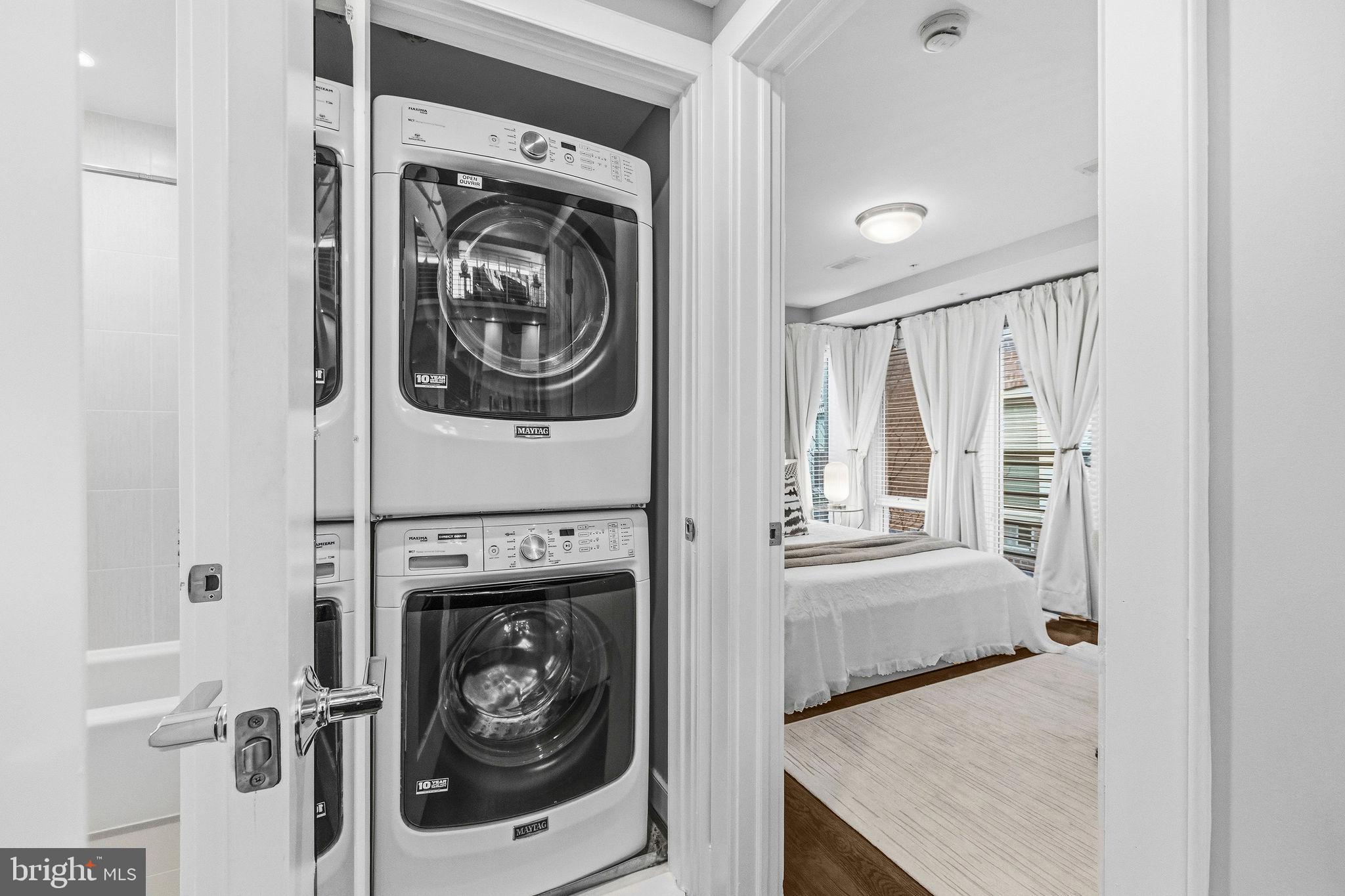 2012 Kalorama Road Northwest, Unit 8 Washington, DC 20009 - Photo 25 of 25 a view of a bedroom with washer and dryer