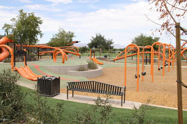 swimming pool view with a seating space