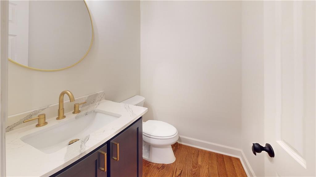 66 Highland Drive Jefferson, GA 30549 - Photo 23 of 63 a bathroom with a sink and a toilet