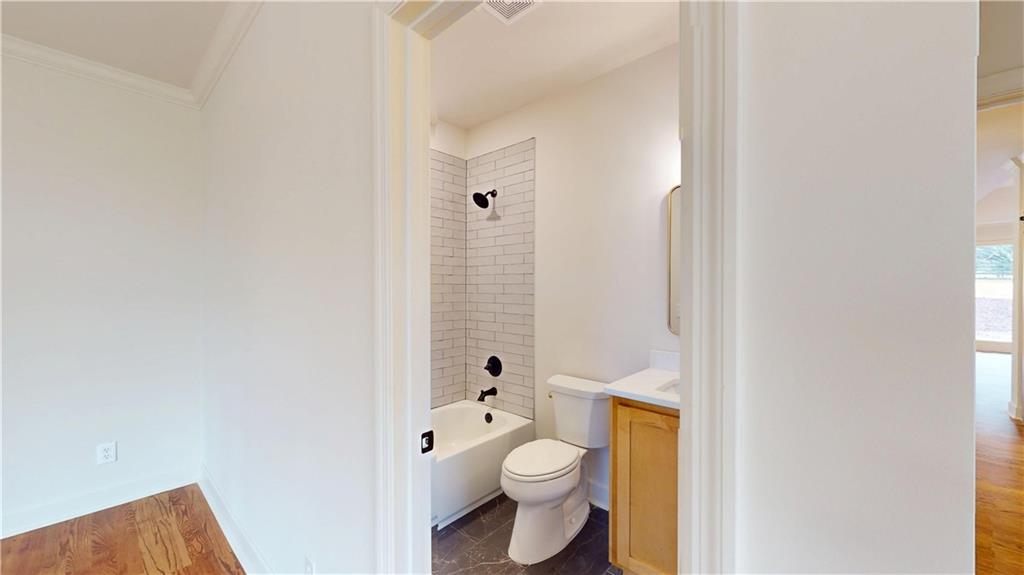 66 Highland Drive Jefferson, GA 30549 - Photo 26 of 63 a bathroom with a toilet and a shower