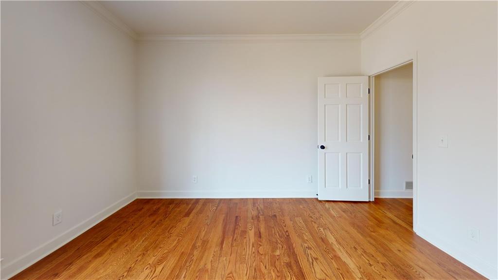 66 Highland Drive Jefferson, GA 30549 - Photo 45 of 63 a view of empty room with wooden floor