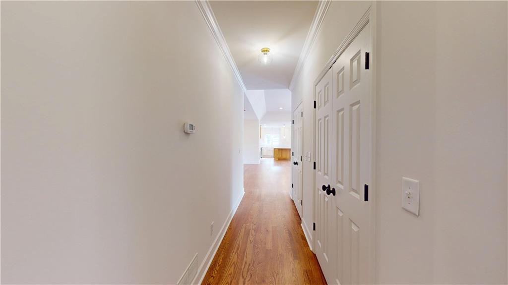 66 Highland Drive Jefferson, GA 30549 - Photo 47 of 63 a view of a hallway with wooden floor and staircase