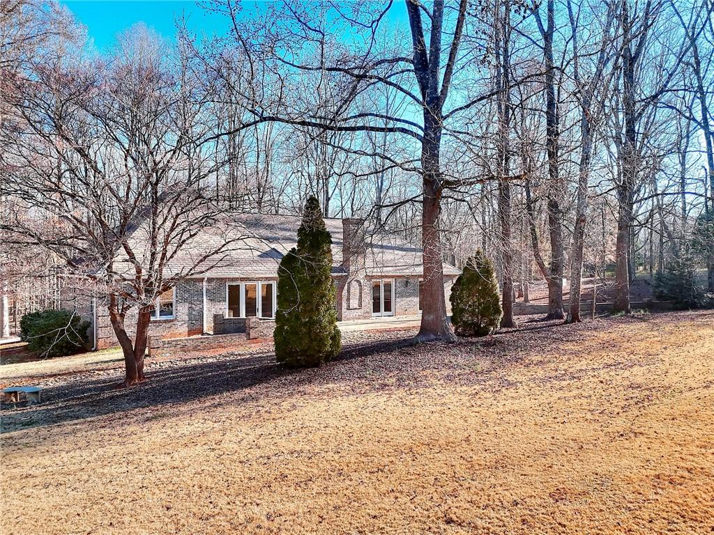 66 Highland Drive Jefferson, GA 30549 - Photo 57 of 63 a view of a house with a snow in the yard