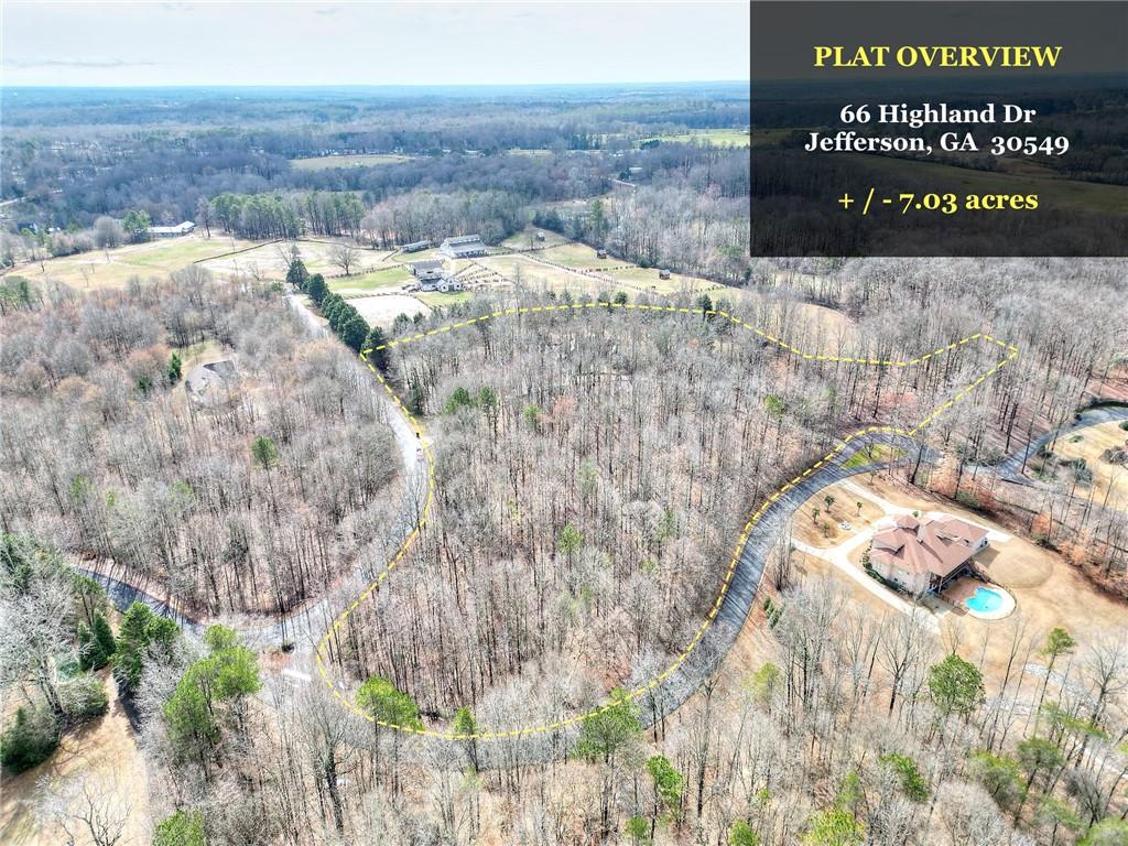 66 Highland Drive Jefferson, GA 30549 - Photo 60 of 63 a view of a dry yard with wooden fence