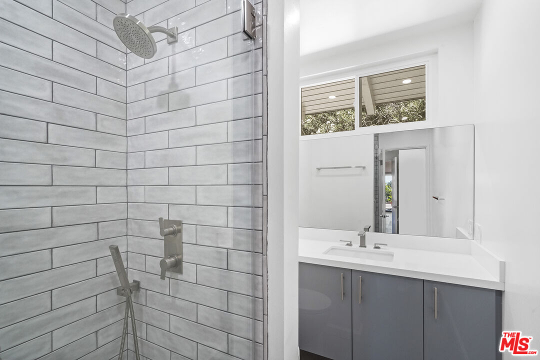 31259 Bailard Road Malibu, CA 90265 - Photo 17 of 43 a bathroom with a sink shower and a mirror