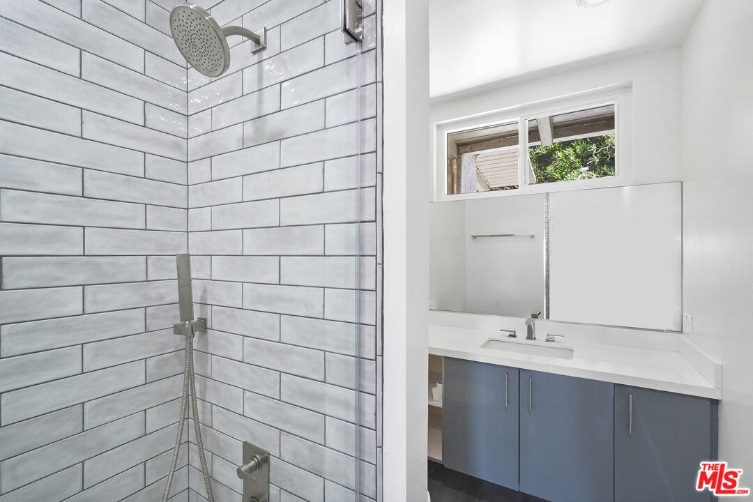 31259 Bailard Road Malibu, CA 90265 - Photo 18 of 43 a bathroom with a sink shower and a mirror