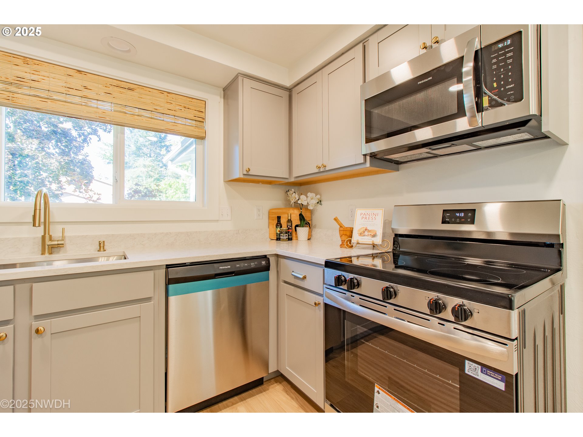 651 T Street Springfield, OR 97477 - Photo 13 of 32 a kitchen with stainless steel appliances granite countertop a sink and a stove