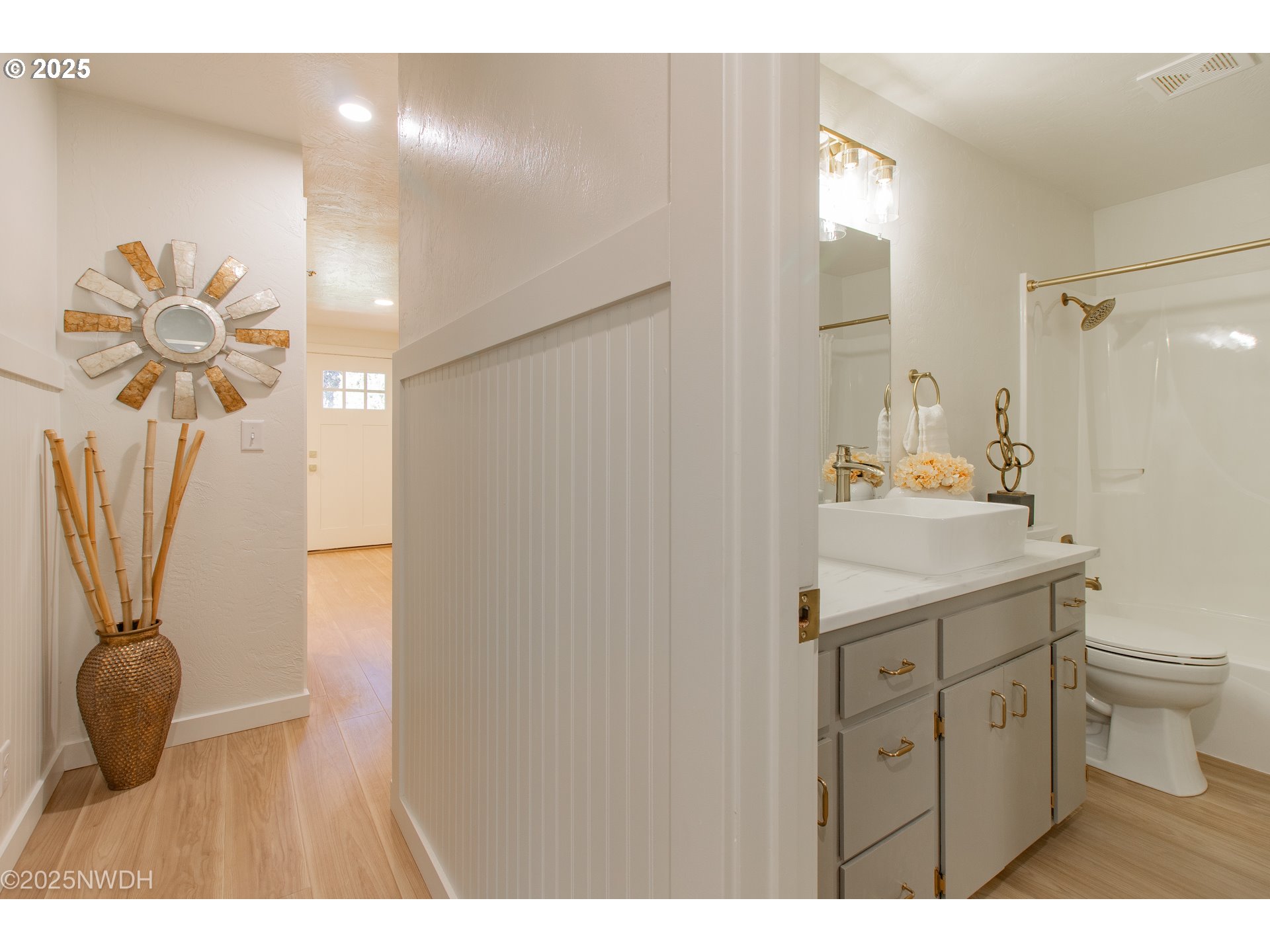 651 T Street Springfield, OR 97477 - Photo 23 of 32 a bathroom with a sink a toilet and a mirror