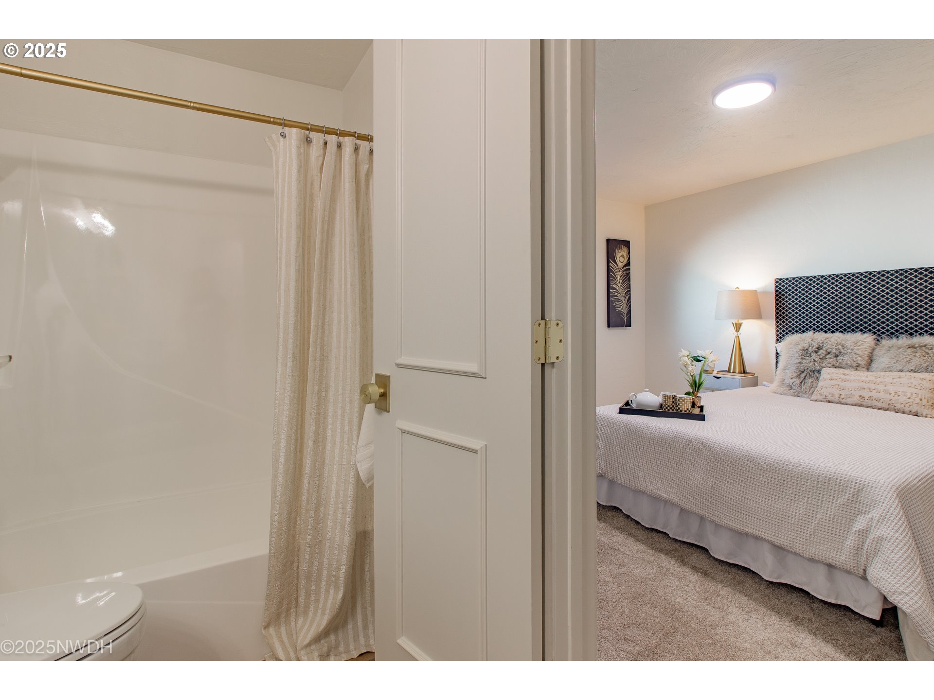 651 T Street Springfield, OR 97477 - Photo 25 of 32 a bedroom with a bed and a walk in closet