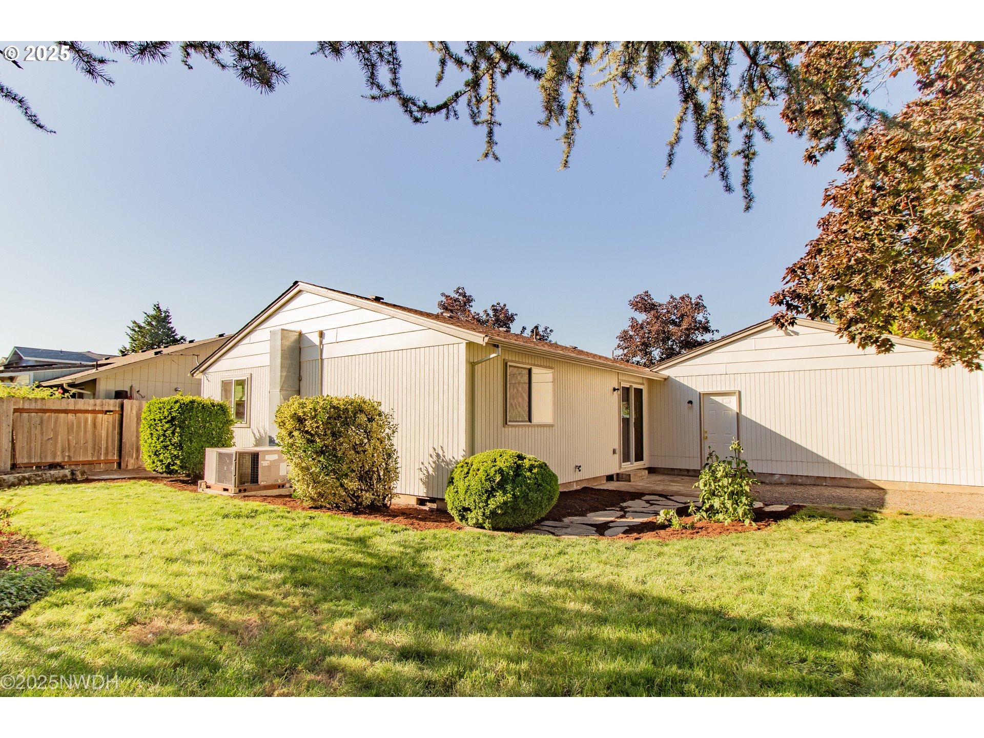 651 T Street Springfield, OR 97477 - Photo 30 of 32 a view of a house with a yard