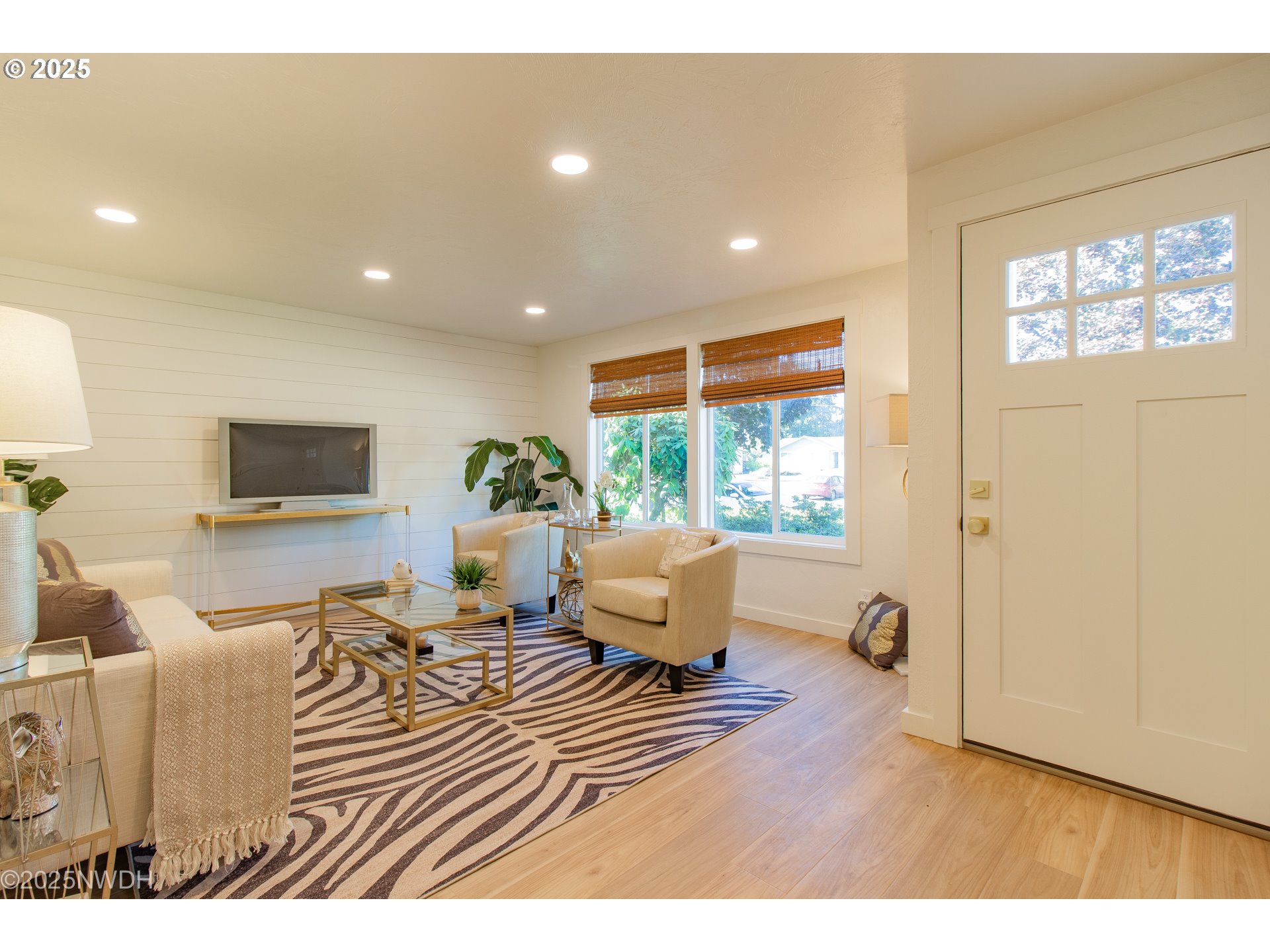 651 T Street Springfield, OR 97477 - Photo 3 of 32 a living room with furniture and a flat screen tv
