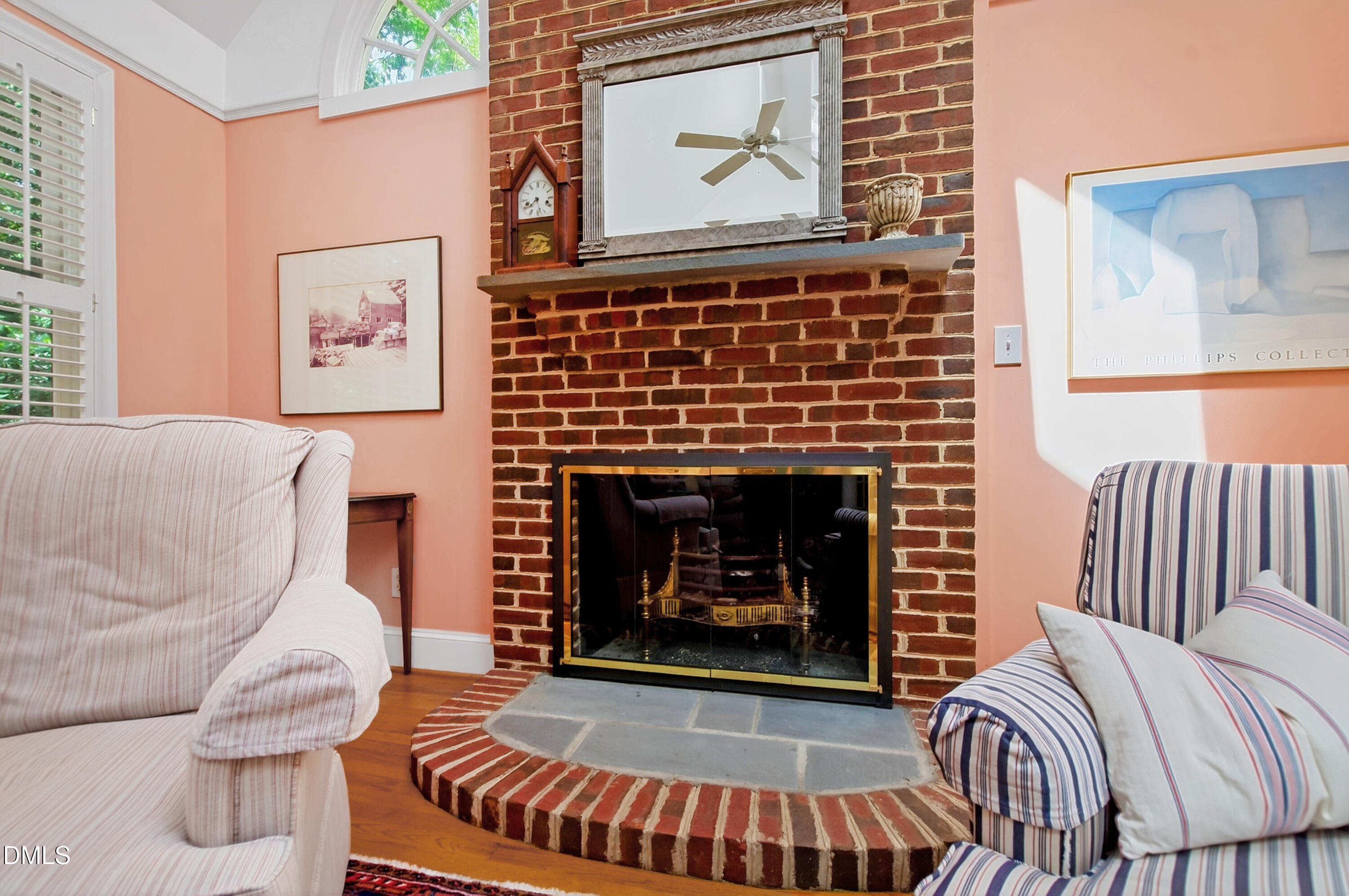 3708 Lubbock Drive Raleigh, NC 27612 - Photo 22 of 64 a living room with furniture and a fireplace
