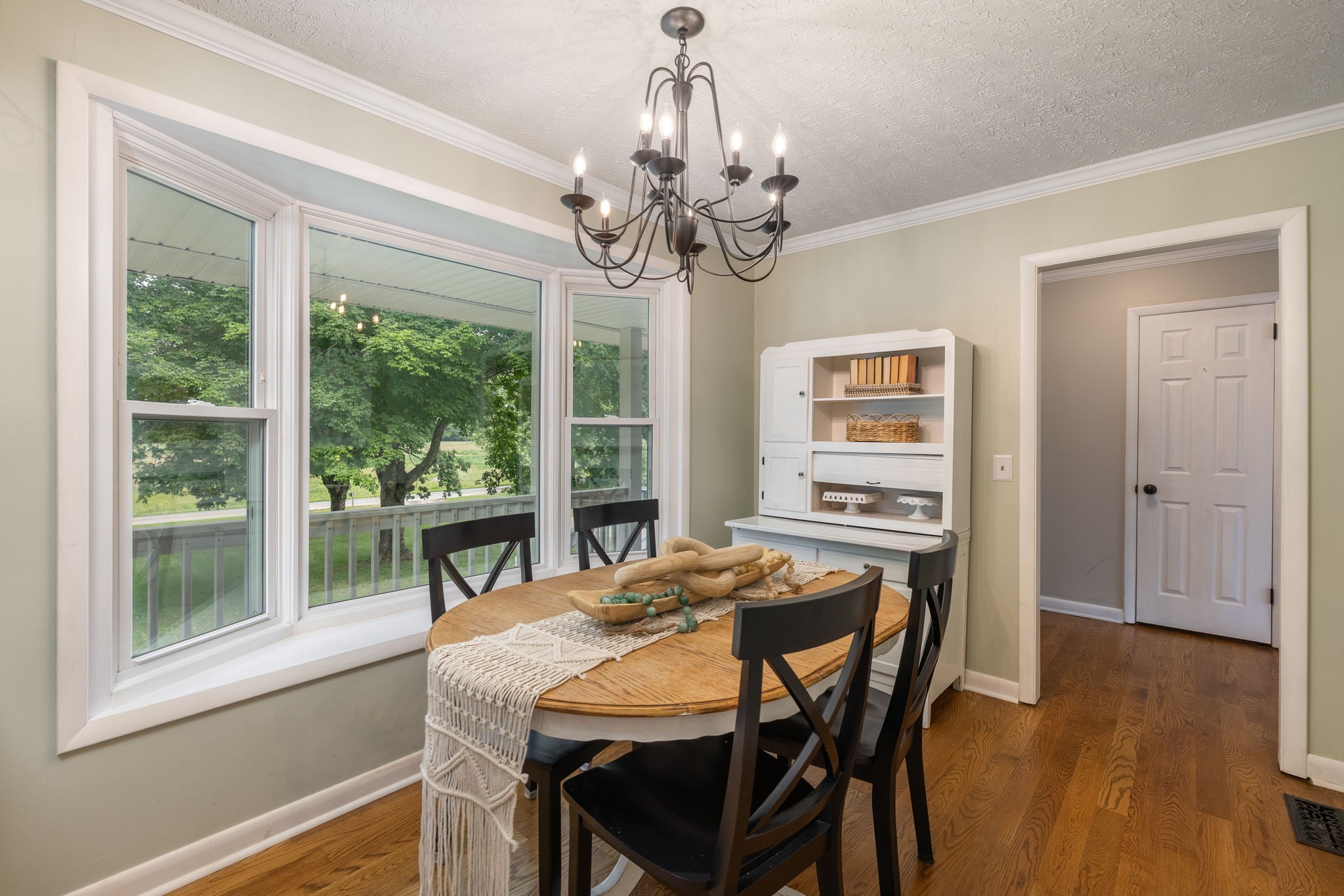 4203 Martins Chapel Road Springfield, TN 37172 - Photo 19 of 52 a view of a dining room with furniture window and wooden floor
