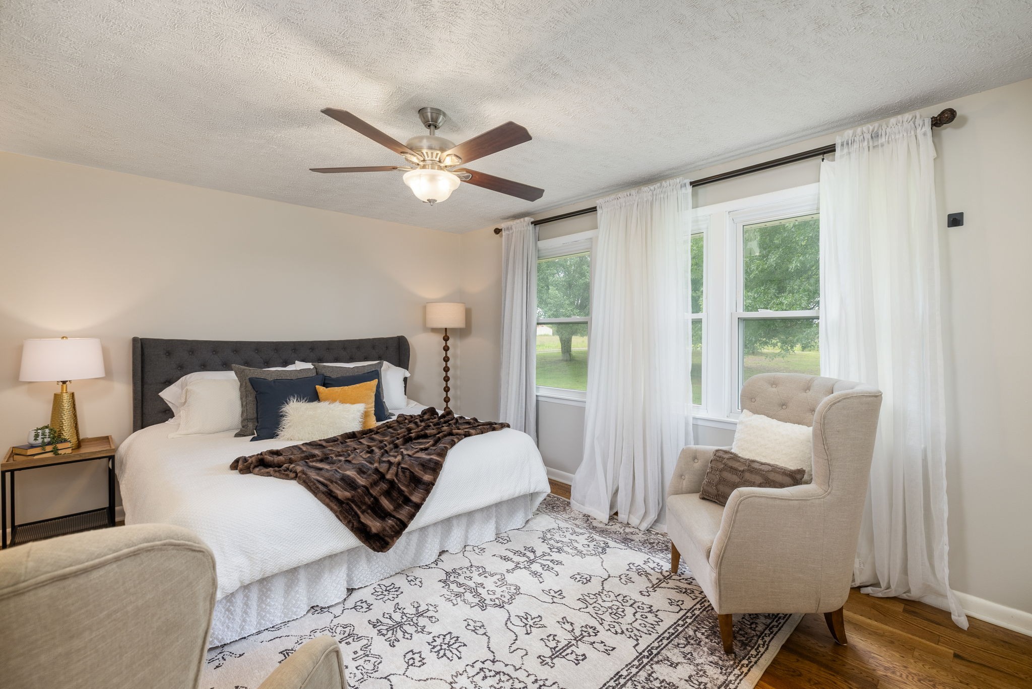 4203 Martins Chapel Road Springfield, TN 37172 - Photo 21 of 52 a bedroom with a large bed and a couch