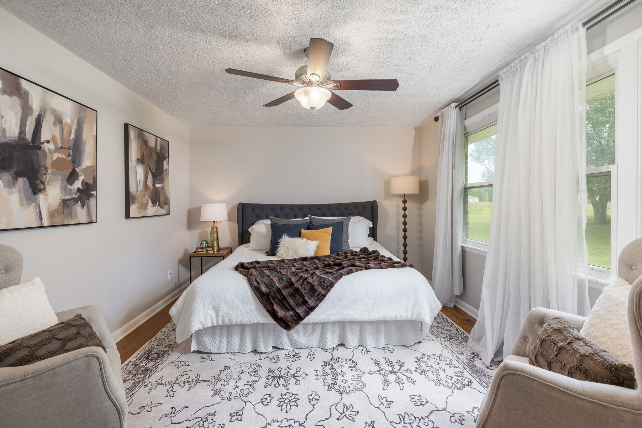 4203 Martins Chapel Road Springfield, TN 37172 - Photo 22 of 52 a bedroom with a bed and wooden floor