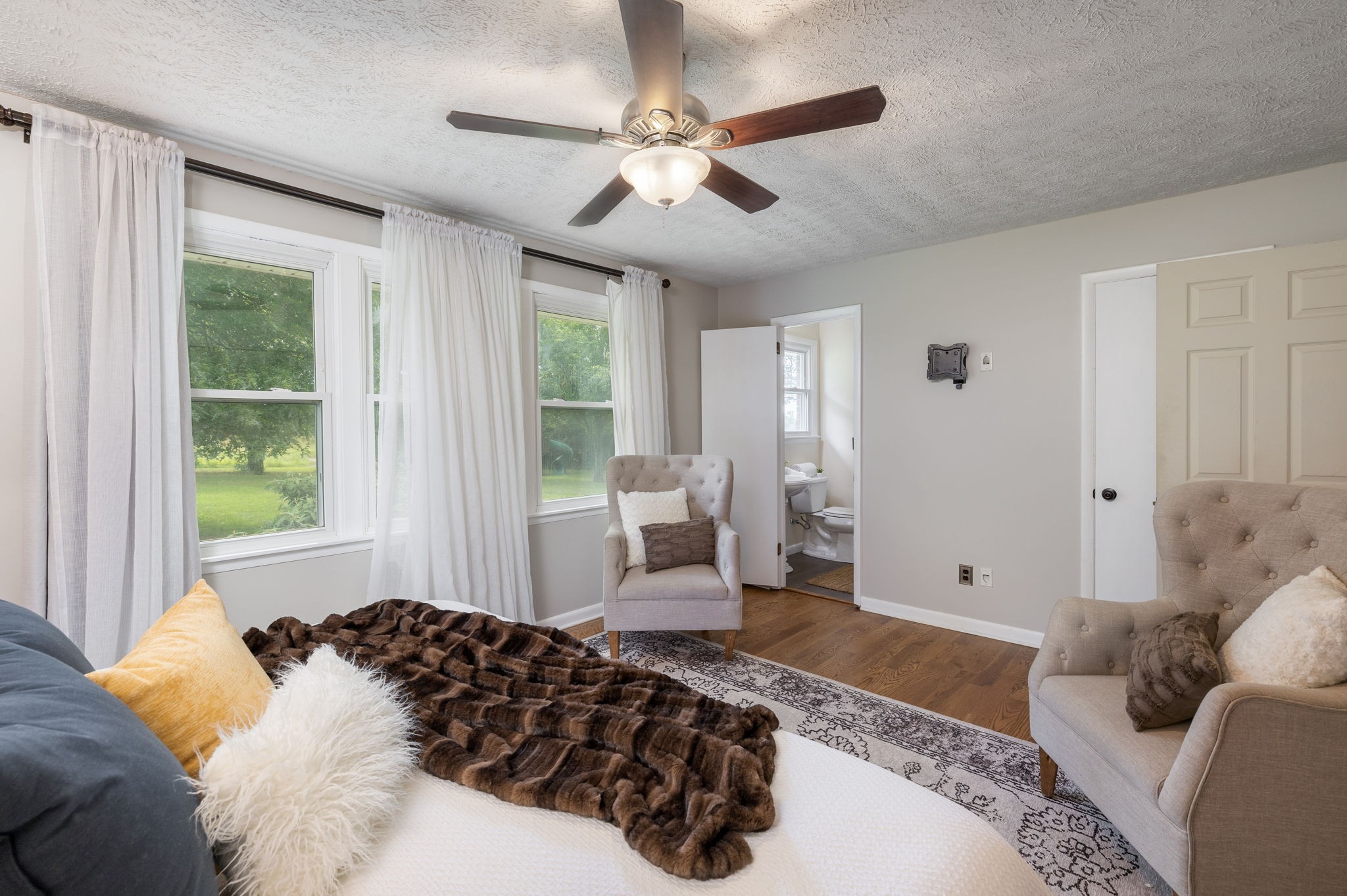 4203 Martins Chapel Road Springfield, TN 37172 - Photo 23 of 52 a bedroom with a large bed and a window
