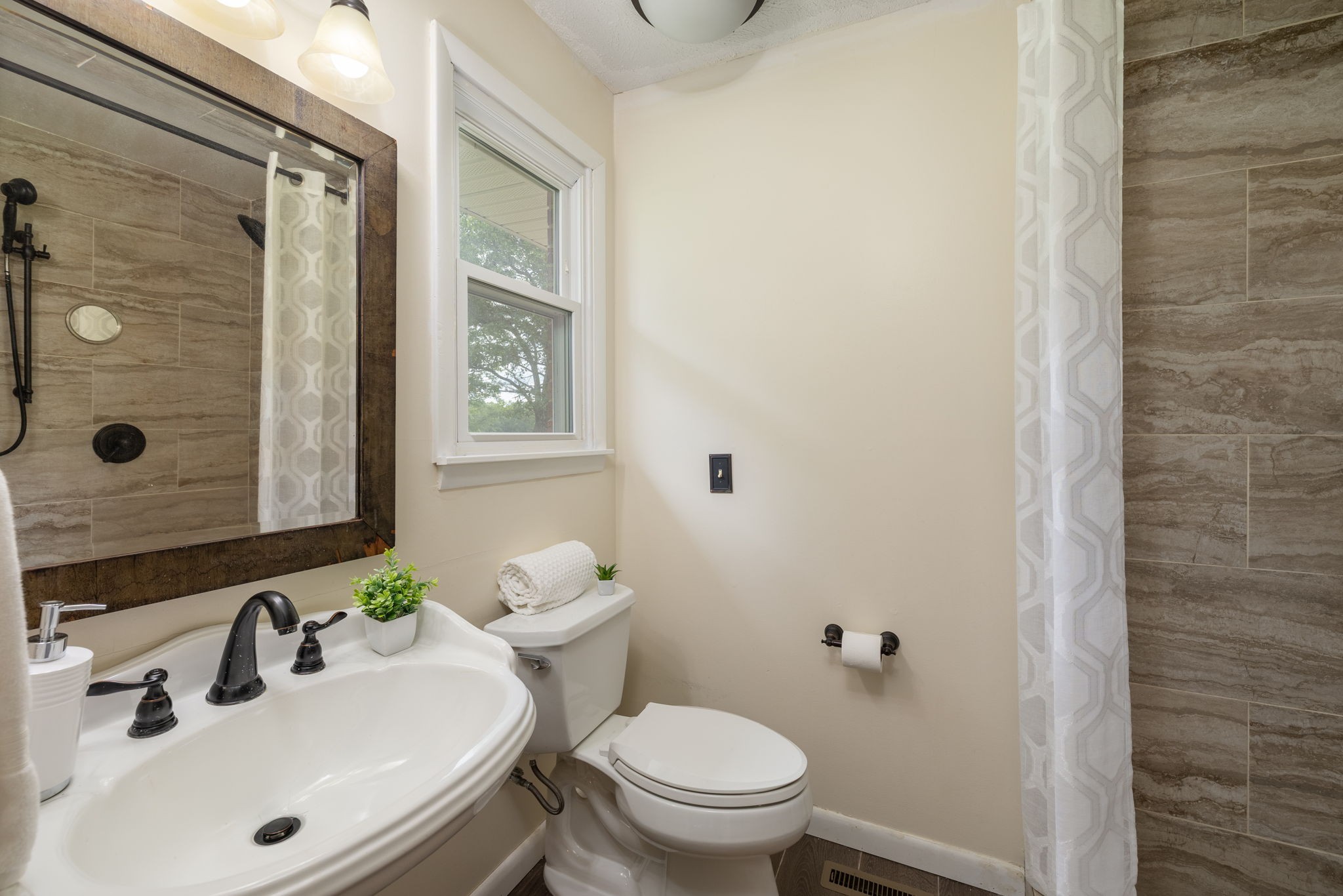 4203 Martins Chapel Road Springfield, TN 37172 - Photo 24 of 52 a bathroom with a sink a toilet and shower