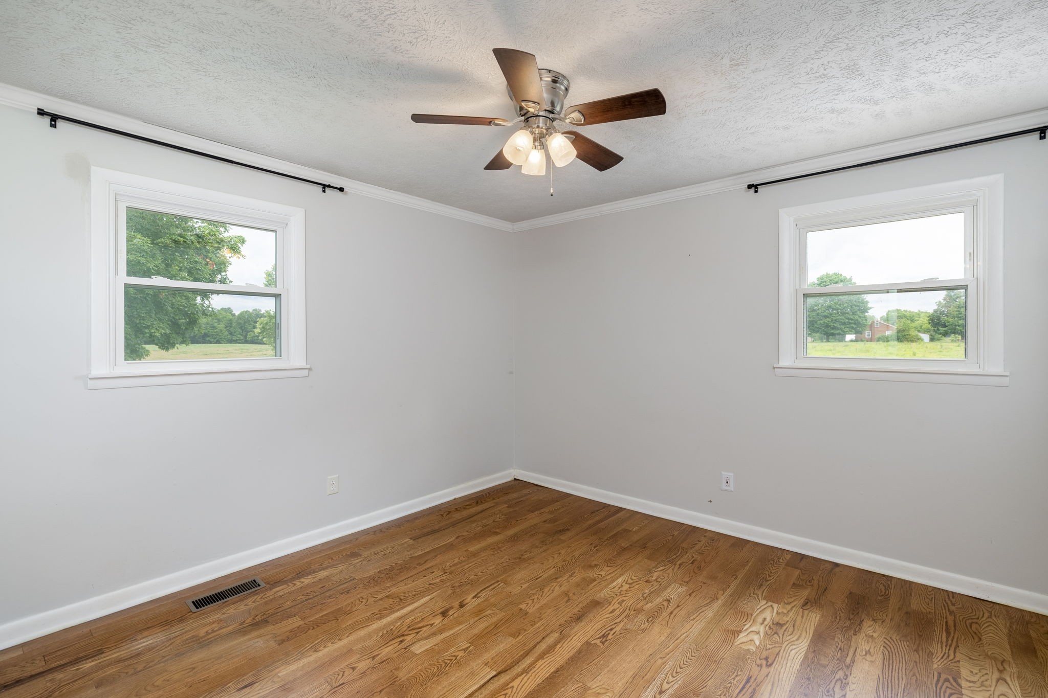 4203 Martins Chapel Road Springfield, TN 37172 - Photo 28 of 52 a view of a big room with wooden floor and windows