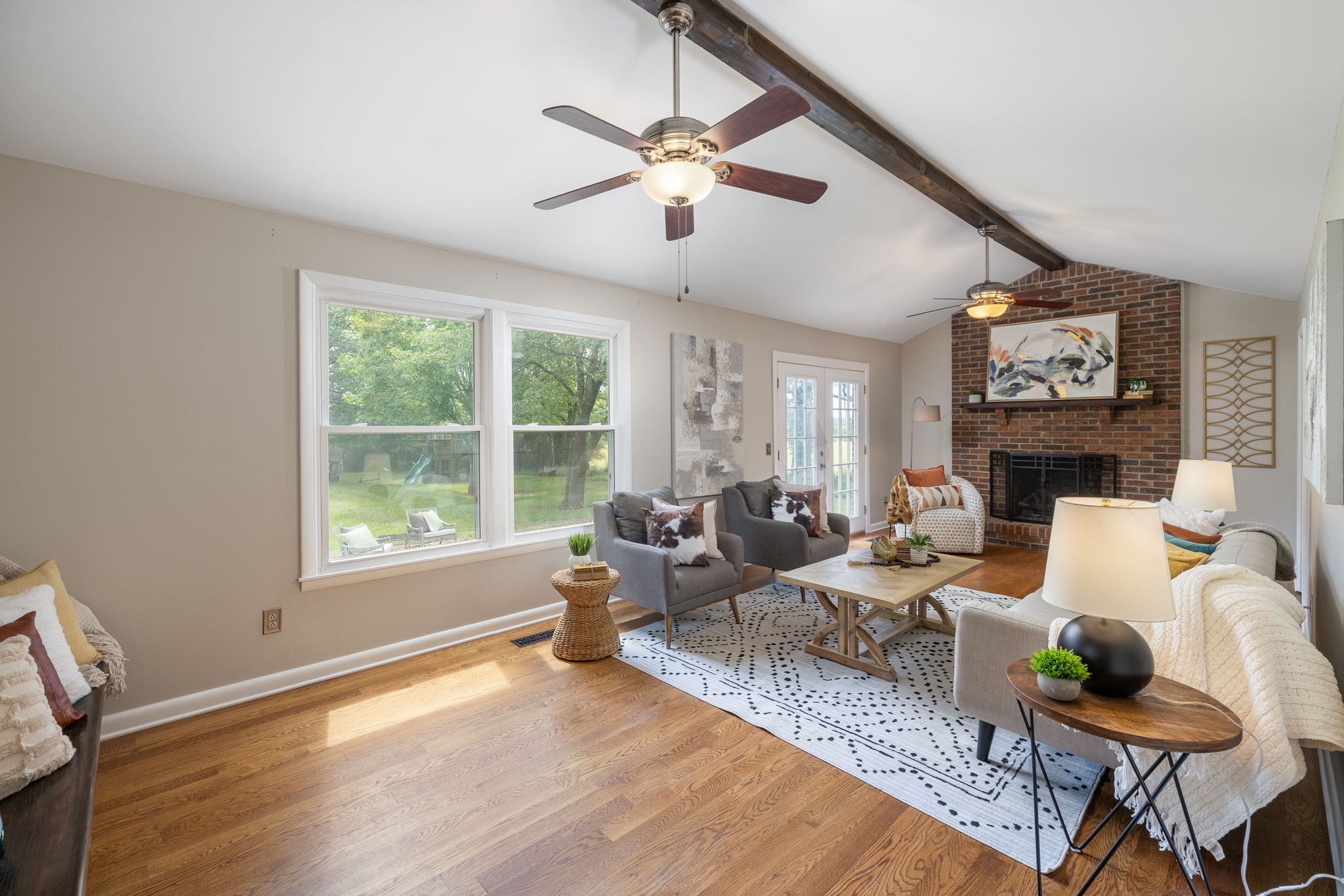 4203 Martins Chapel Road Springfield, TN 37172 - Photo 10 of 52 a living room with fireplace furniture and a large window