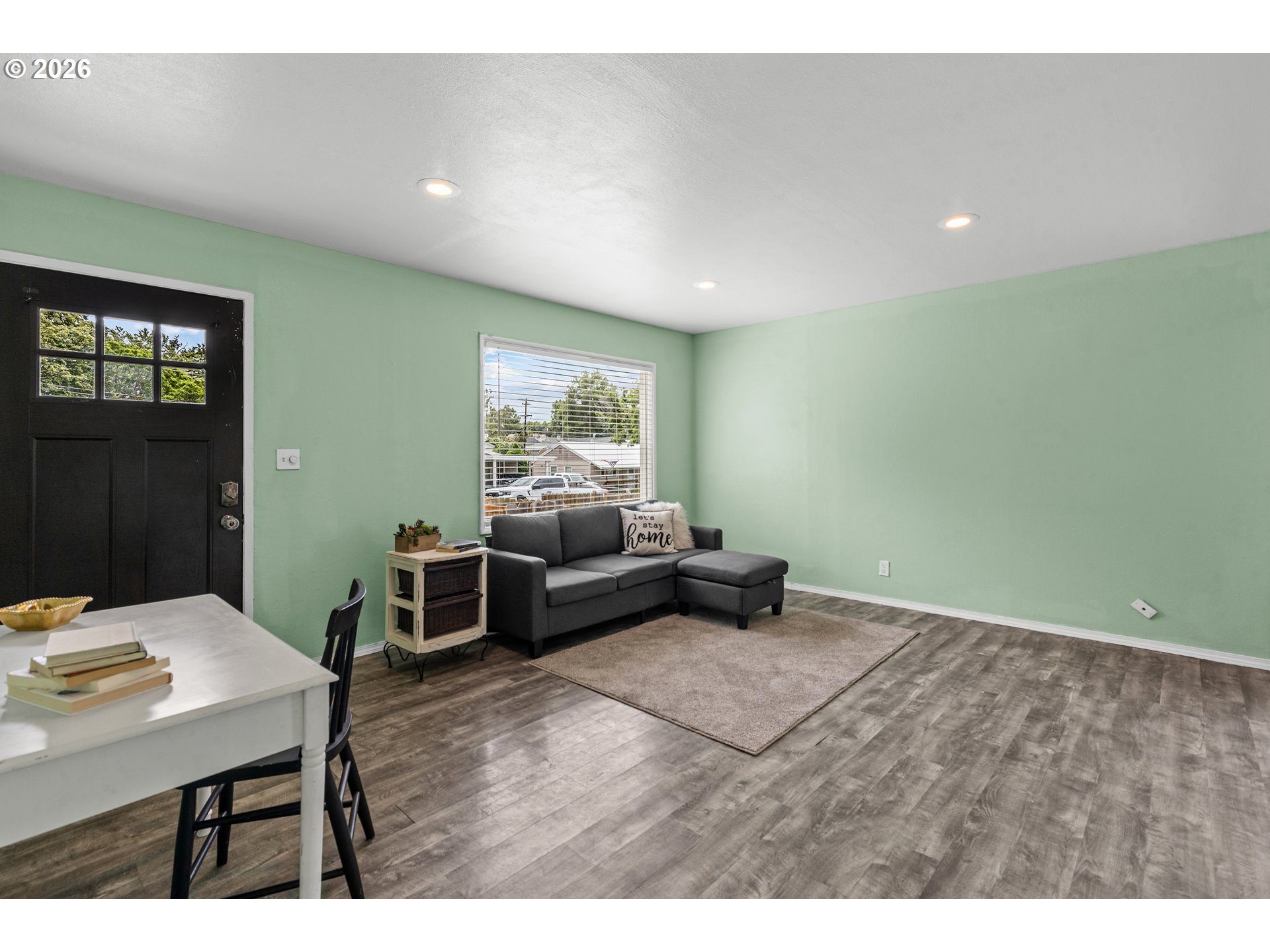 3009 Southwest Isaac Avenue Pendleton, OR 97801 - Photo 16 of 28 a living room with furniture and a table