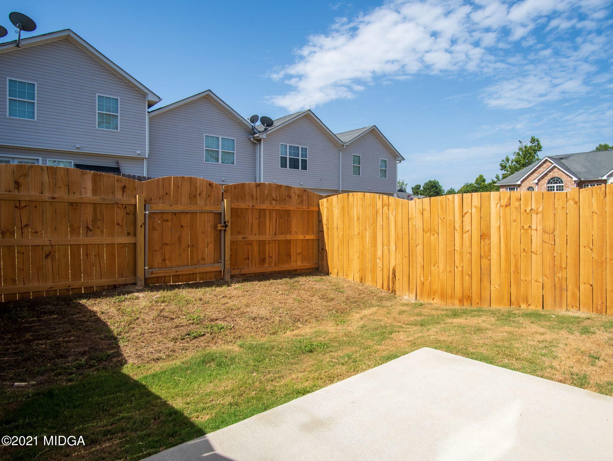 333 Pond View Road Macon, GA 31206 - Photo 16 of 22 a view of a house with a backyard
