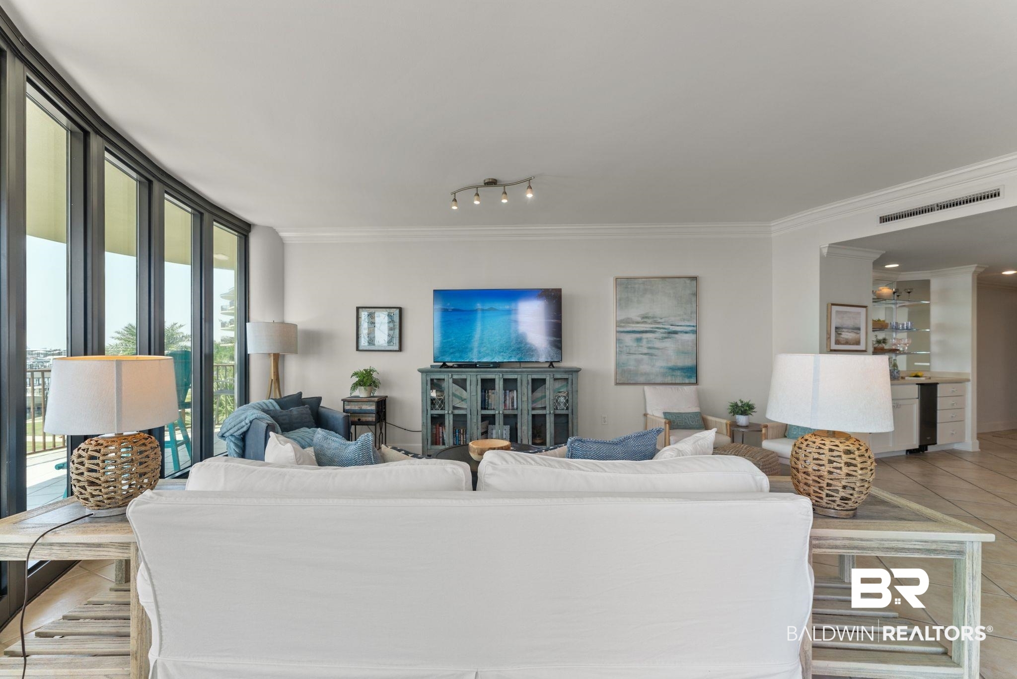 27580 Canal Road, Unit 1233 Orange Beach, AL 36561 - Photo 44 of 79 Living room featuring ornamental molding