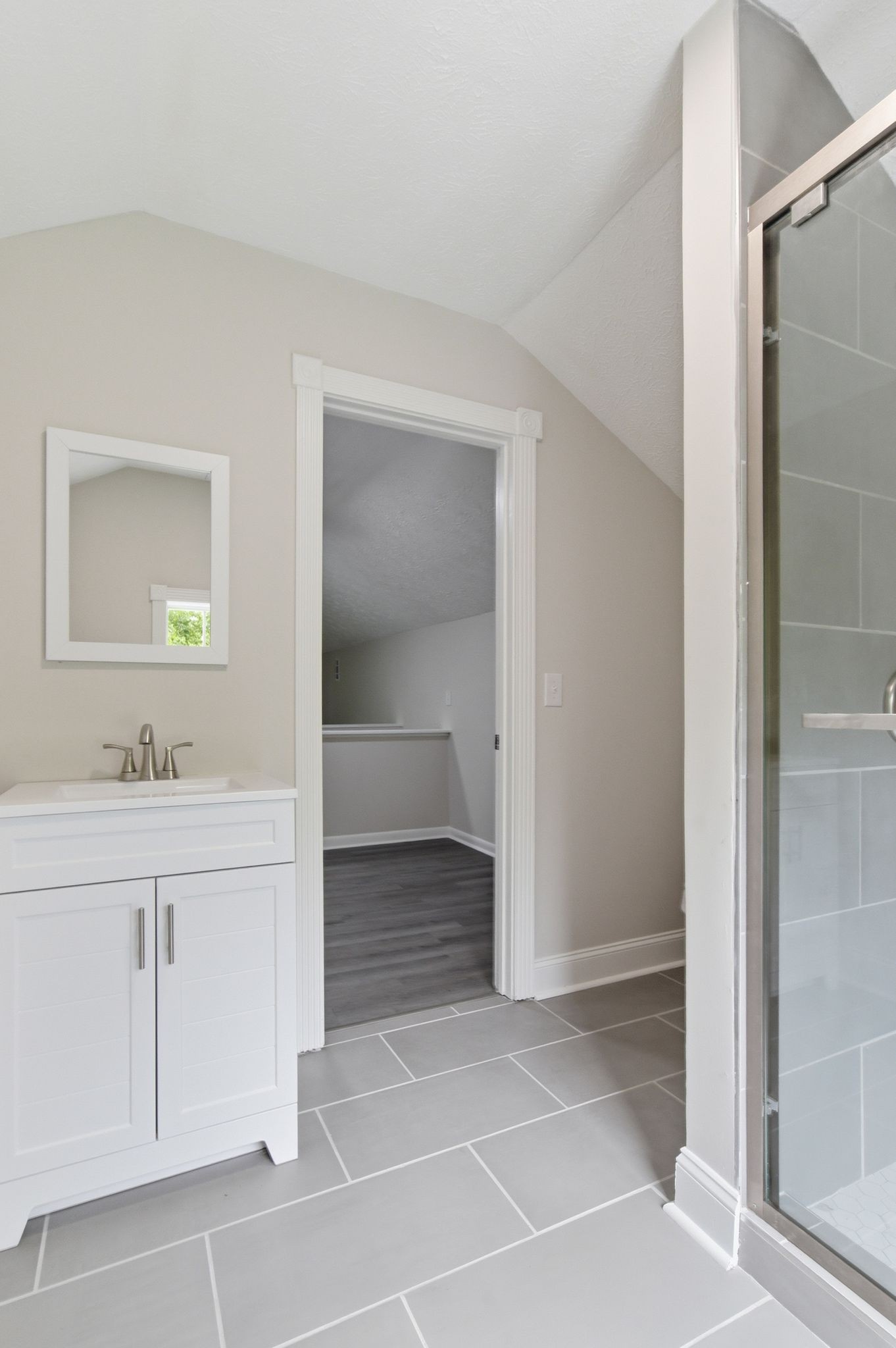 305 South Irwin Street Manchester, TN 37355 - Photo 34 of 40 a bathroom with a sink and a mirror