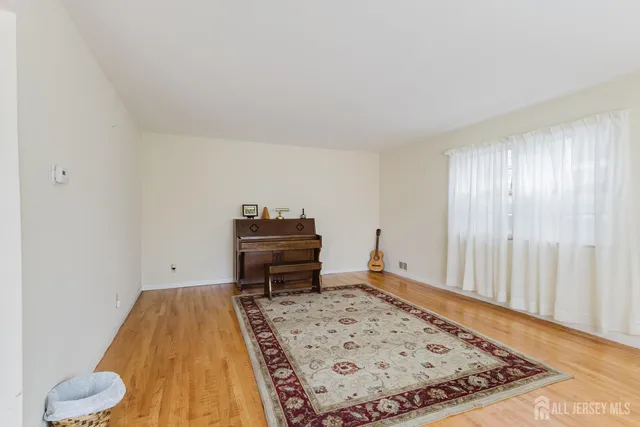 a bathroom with a toilet a sink and a shower